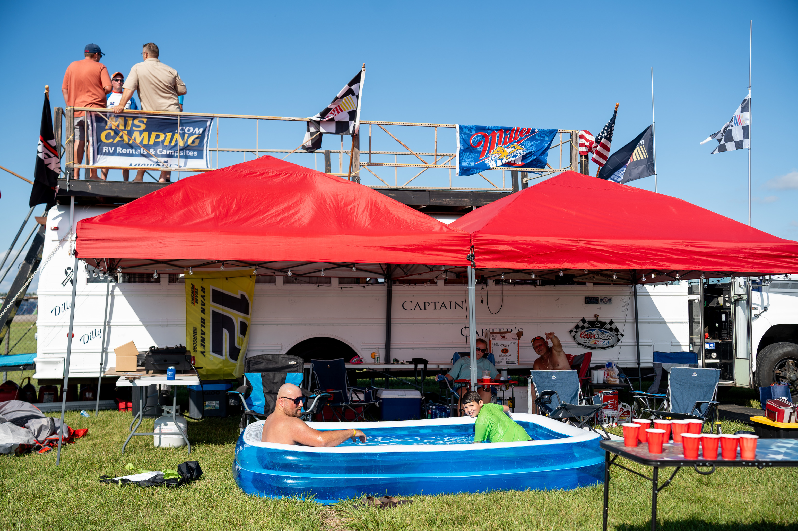Day and night inside the infield at Michigan International Speedway ...