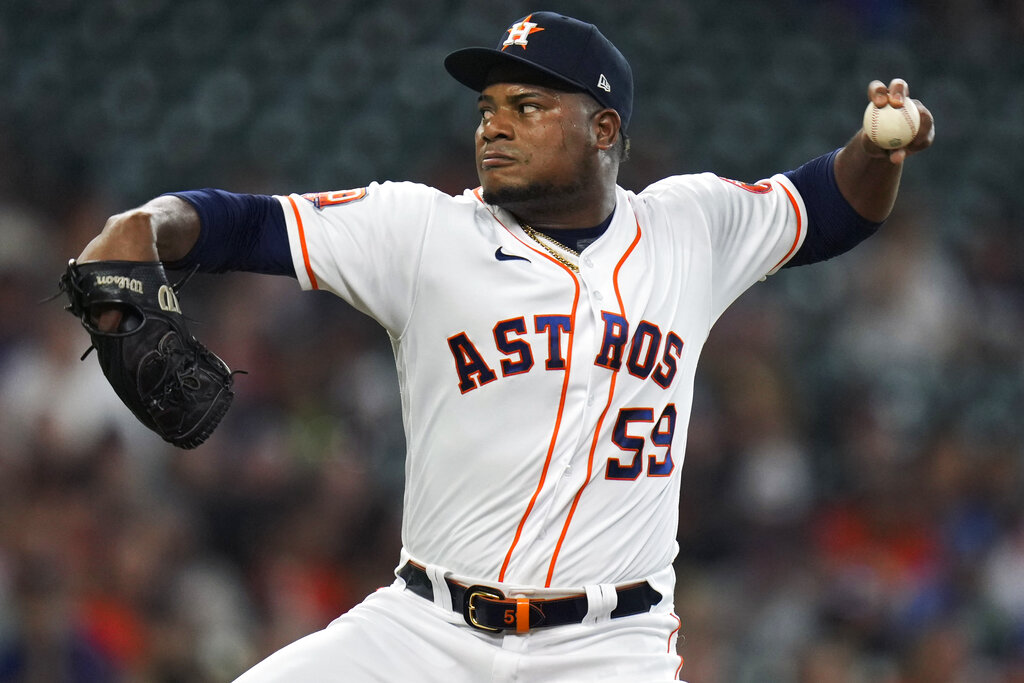 Houston Astros catcher Martin Maldonado and relief pitcher Rafael