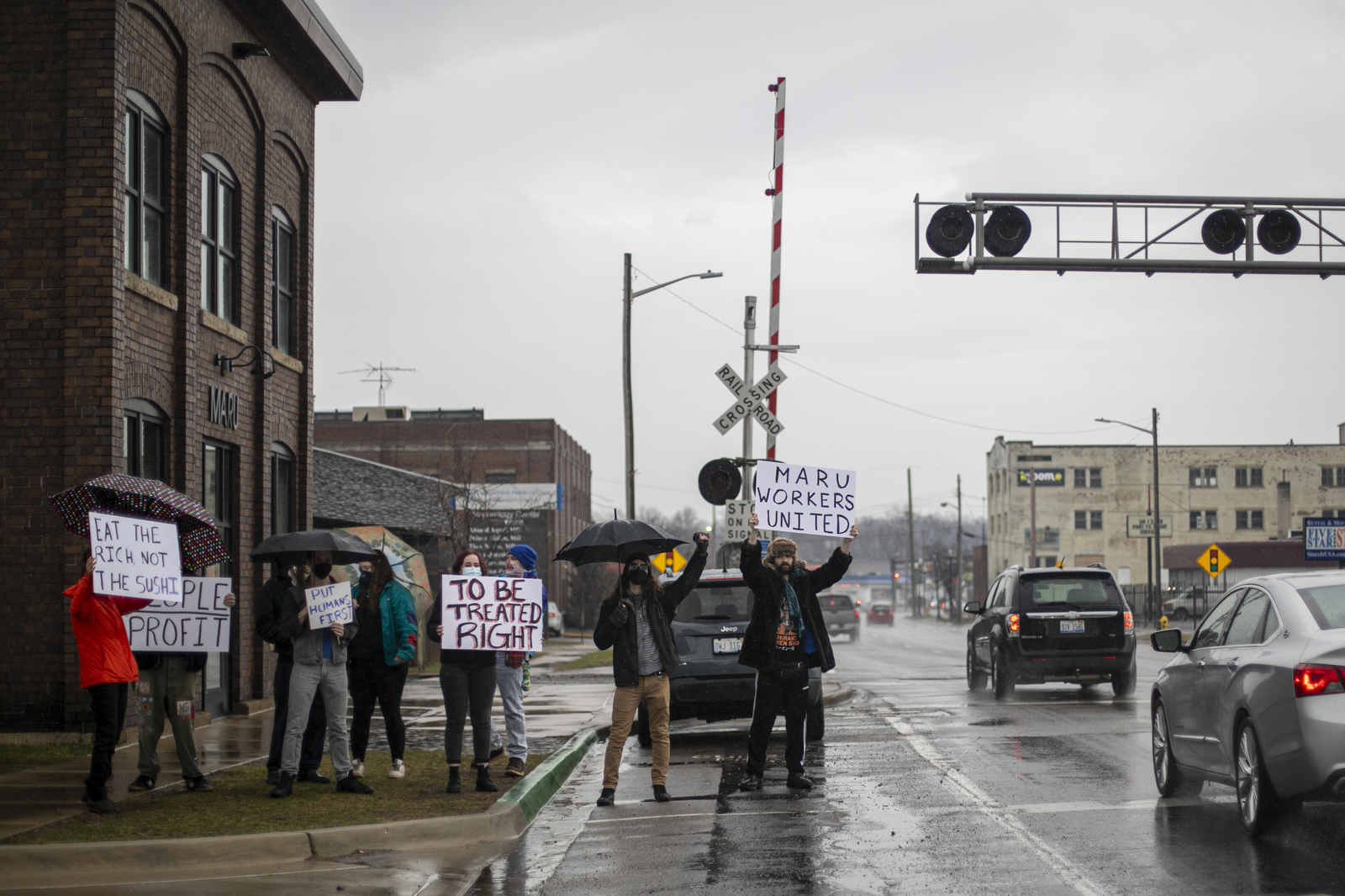 Maru Sushi workers on strike in downtown Kalamazoo