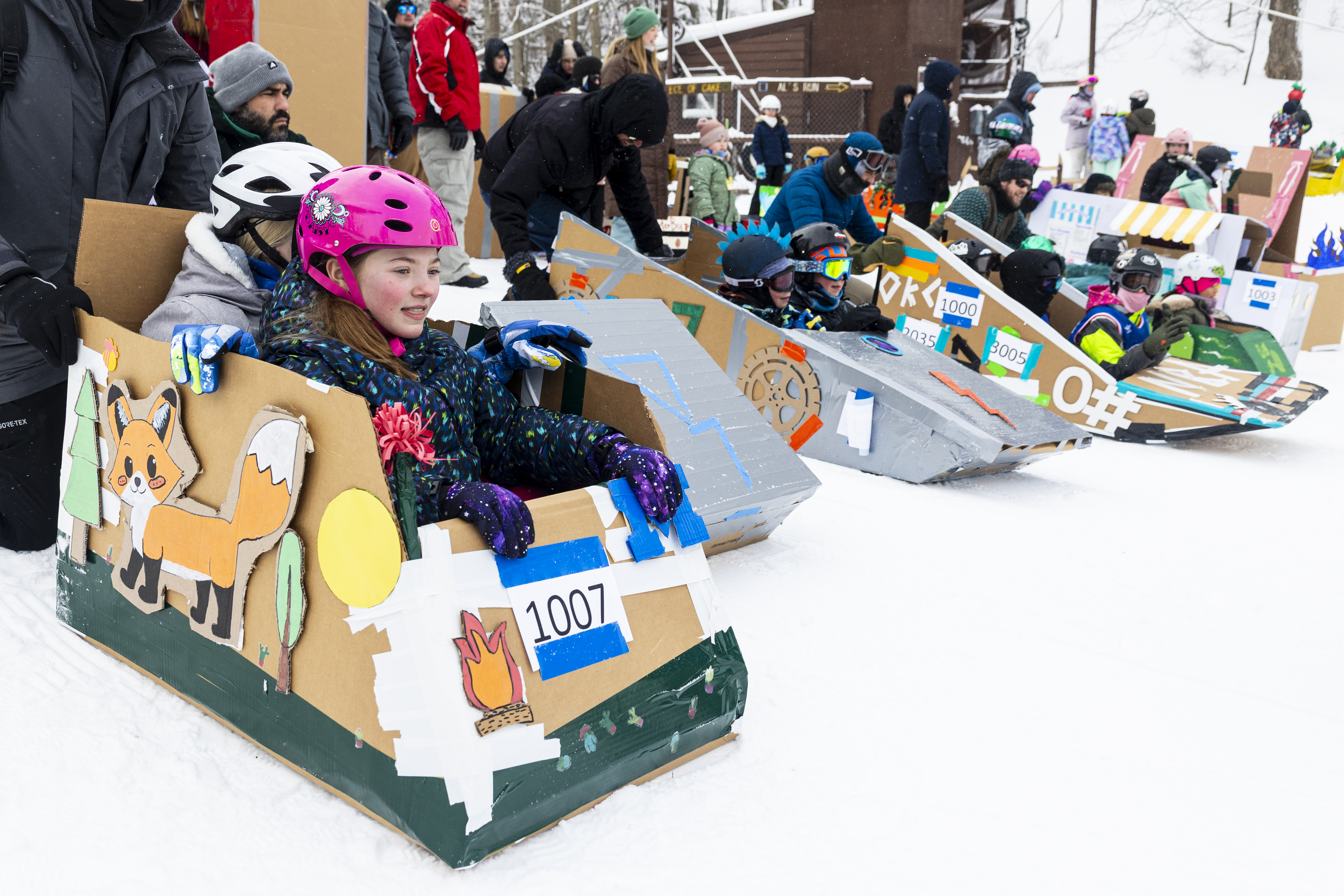 Customized cardboard sleds race down ski hill for 50th edition of 