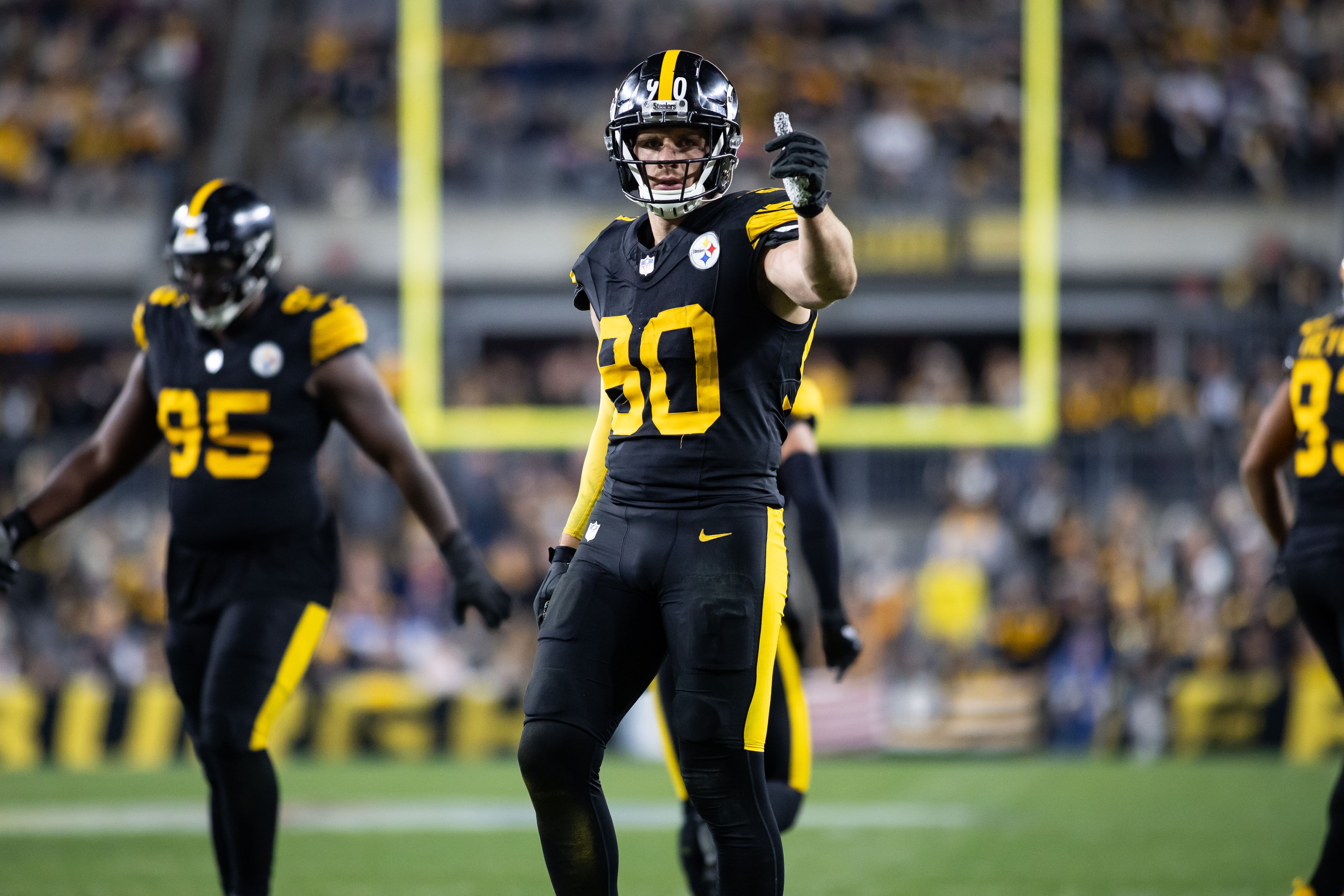 T.J. Watt promises to win a playoff game after signing huge