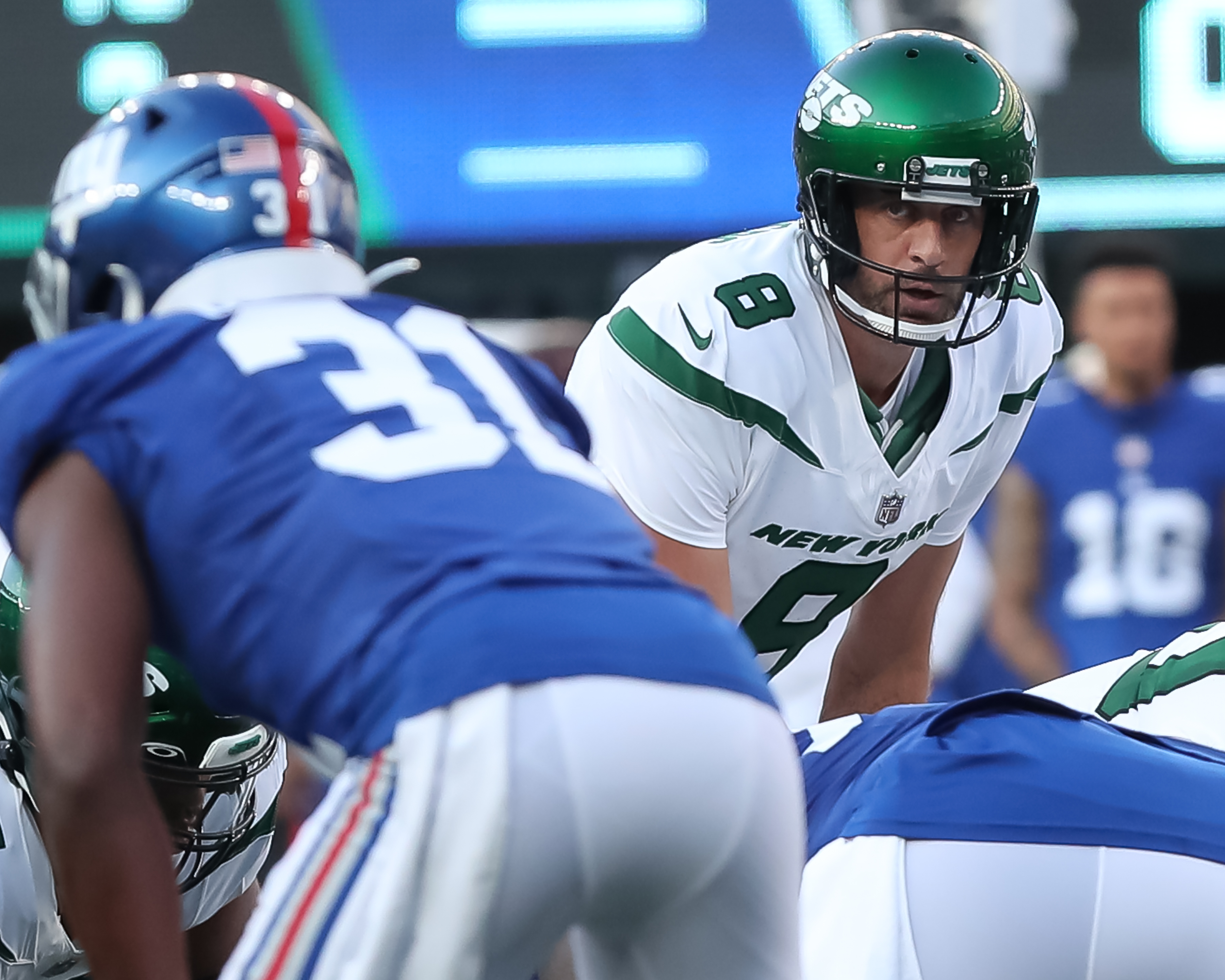 New York Jets quarterback Aaron Rodgers (8) runs off the field during  halftime of an NFL preseason football game against the New York Giants,  Saturday, Aug. 26, 2023, in East Rutherford, N.J. (