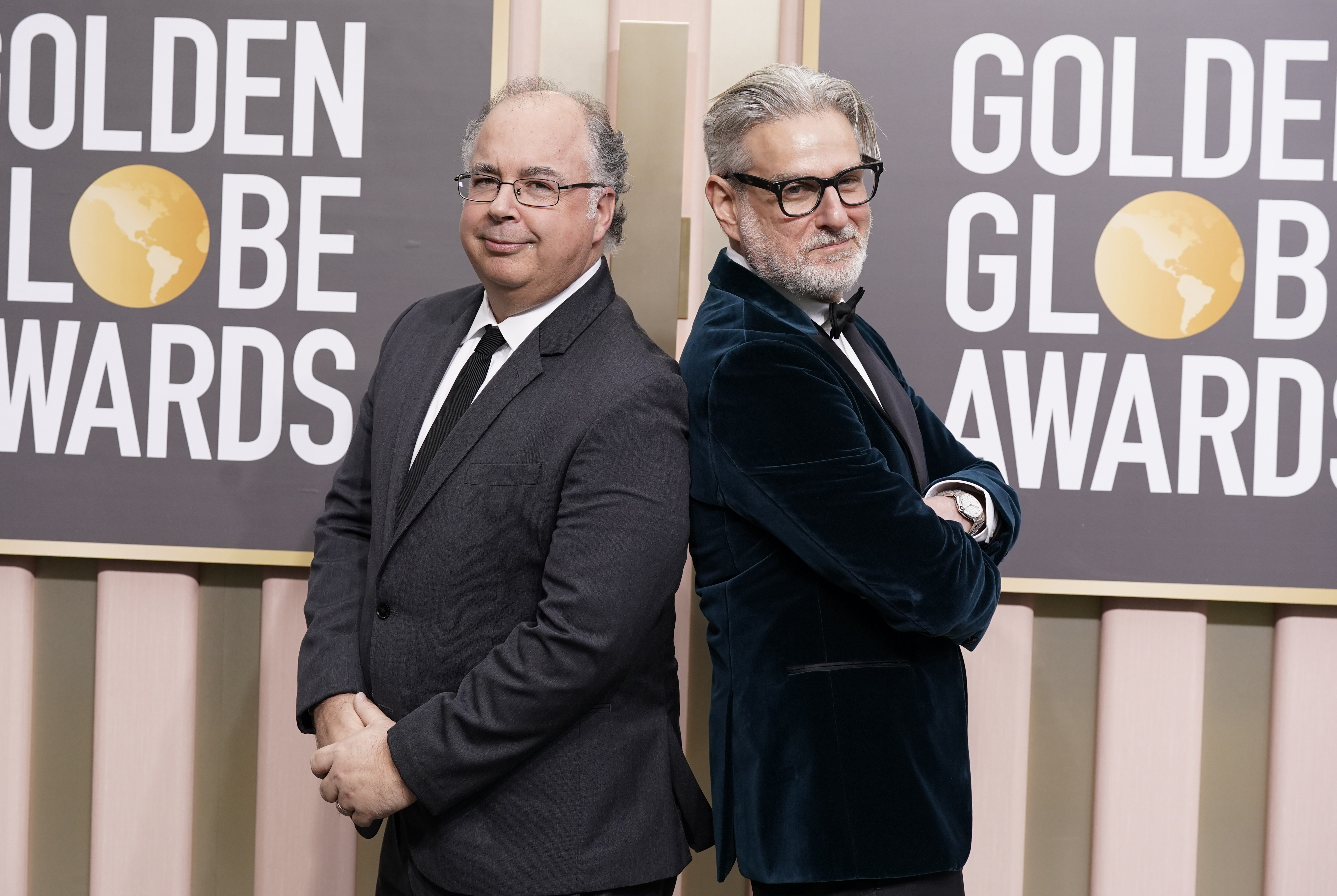 Thomas Schnauz, left, and Peter Gould arrive at the 80th annual Golden Globe Awards at the Beverly Hilton Hotel on Tuesday, Jan. 10, 2023, in Beverly Hills, Calif. (Photo by Jordan Strauss/Invision/AP)