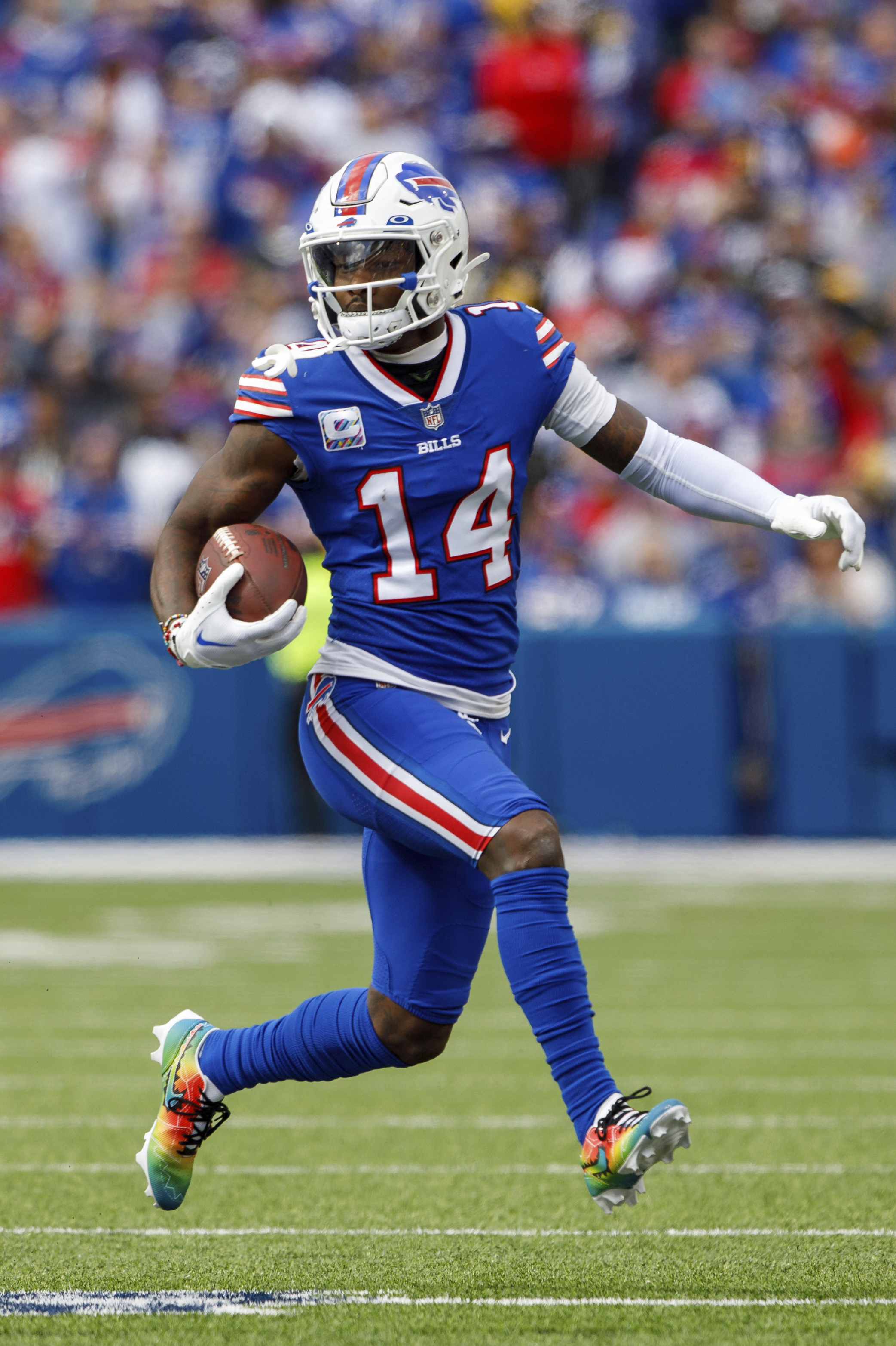 Buffalo Bills running back Devin Singletary (26) runs with the ball during  the first half of an NFL football game against the Pittsburgh Steelers in  Orchard Park, N.Y., Sunday, Oct. 9, 2022. (