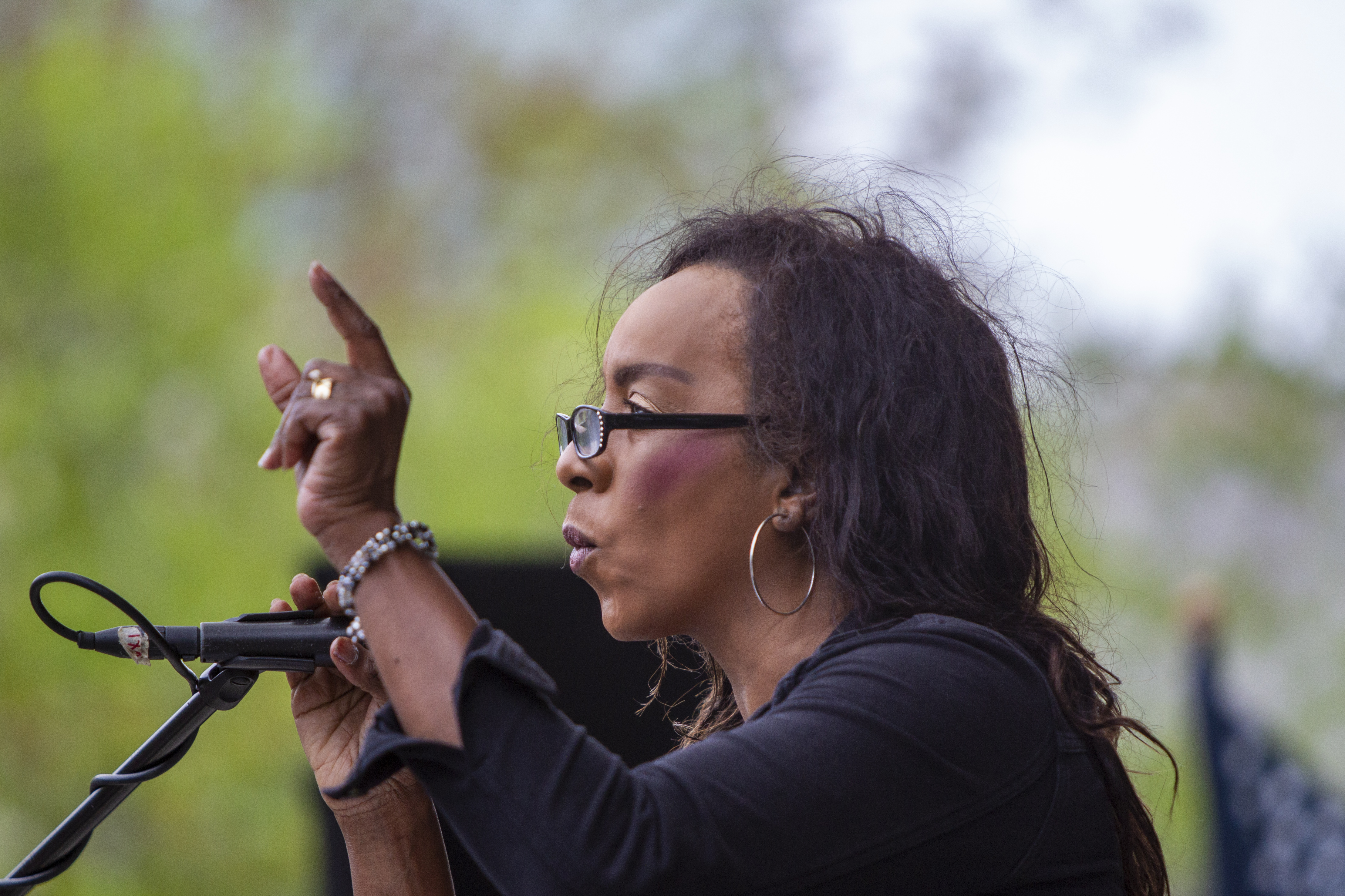 Pastor Bernadette Smith takes part in the "American Patriot Rally-Sheriffs speak out" event at Rosa Parks Circle in downtown Grand Rapids on Monday, May 18, 2020. The crowd is protesting against Gov. Gretchen Whitmer's stay-at-home order. (Cory Morse | MLive.com)