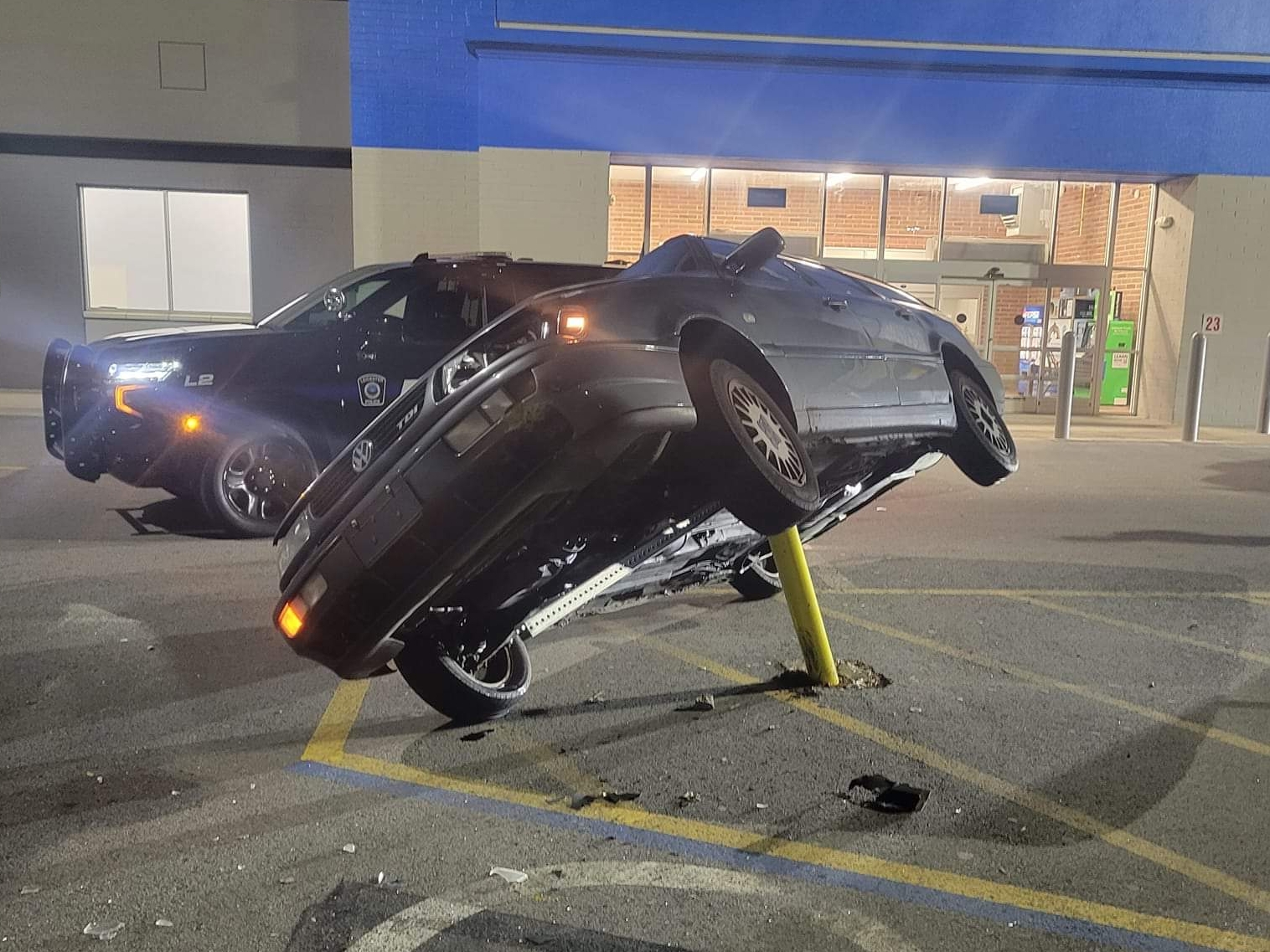 Car found impaled in Walmart Supercenter parking lot in Leicester 