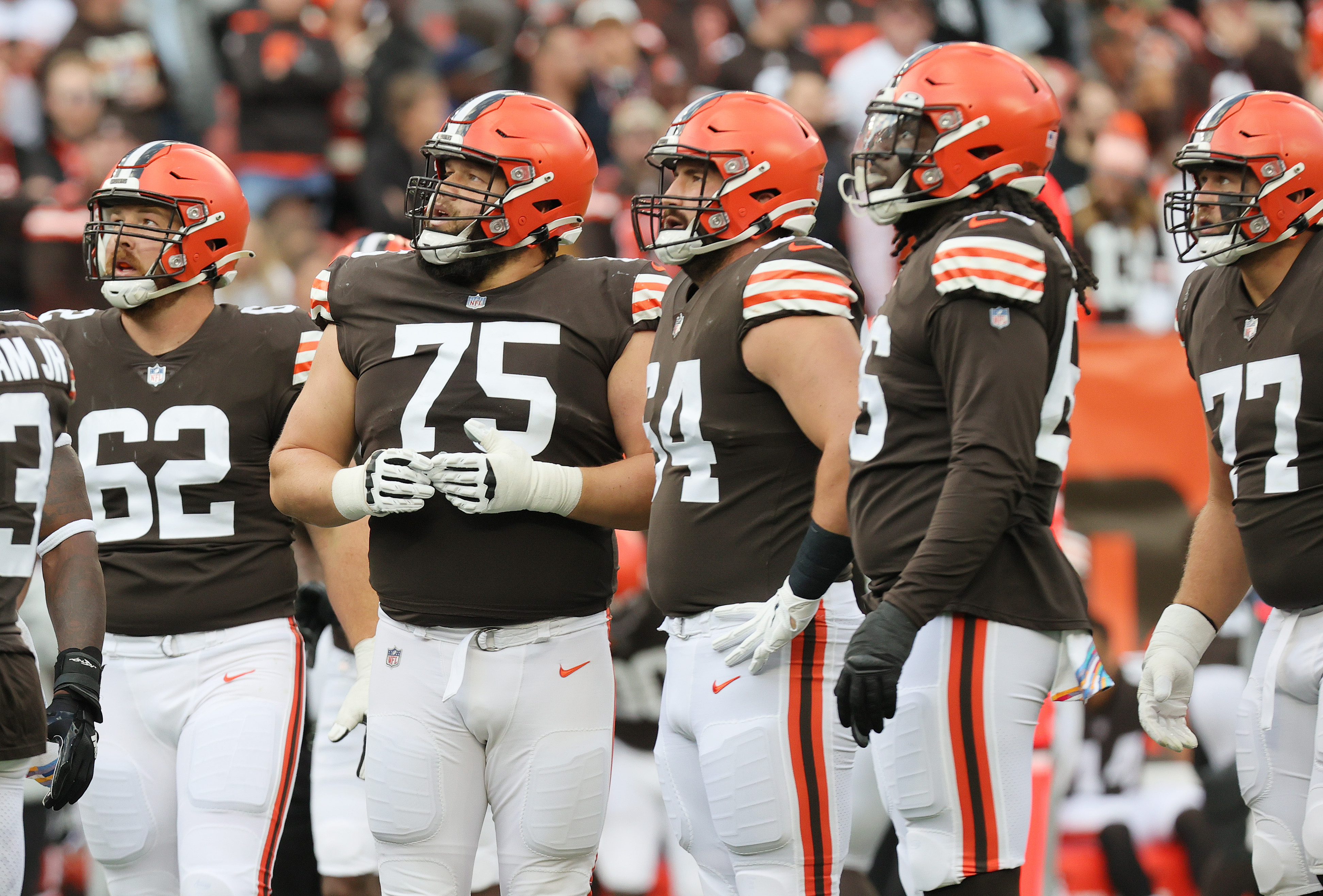 Cleveland Browns offensive tackle James Hudson III (66) lines up for a play  during an NFL football game against the Baltimore Ravens, Sunday, Dec. 12,  2021, in Cleveland. (AP Photo/Kirk Irwin Stock