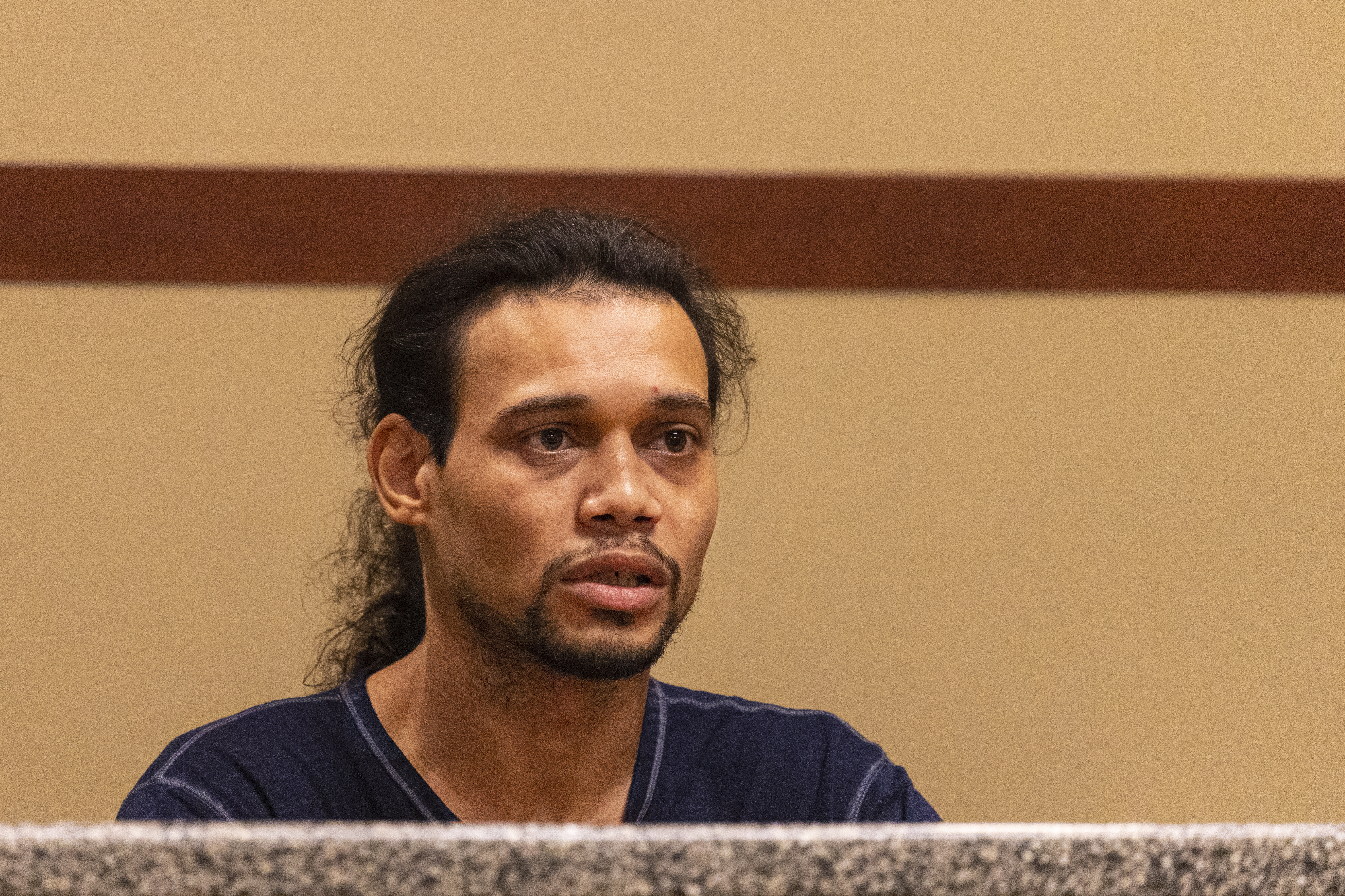 Kenneth Harris testifies a witness who called 911 after seeing Joseph Wilder’s truck crash speaks during the preliminary examination for (not pictured) Rishy Manning, 22, Javonte Rosa, 23 and Jaheim Hayes-Goree, 20, at the 63rd District Courthouse in Grand Rapids, Michigan on Thursday, June 30, 2022. The trio of defendants who appeared in court, are charged with felony murder in the shooting death of Wilder, 50, who was shot and killed during a robbery attempt at a Huntington Bank ATM on South Division Avenue in May of 2022. (Joel Bissell | MLive.com)