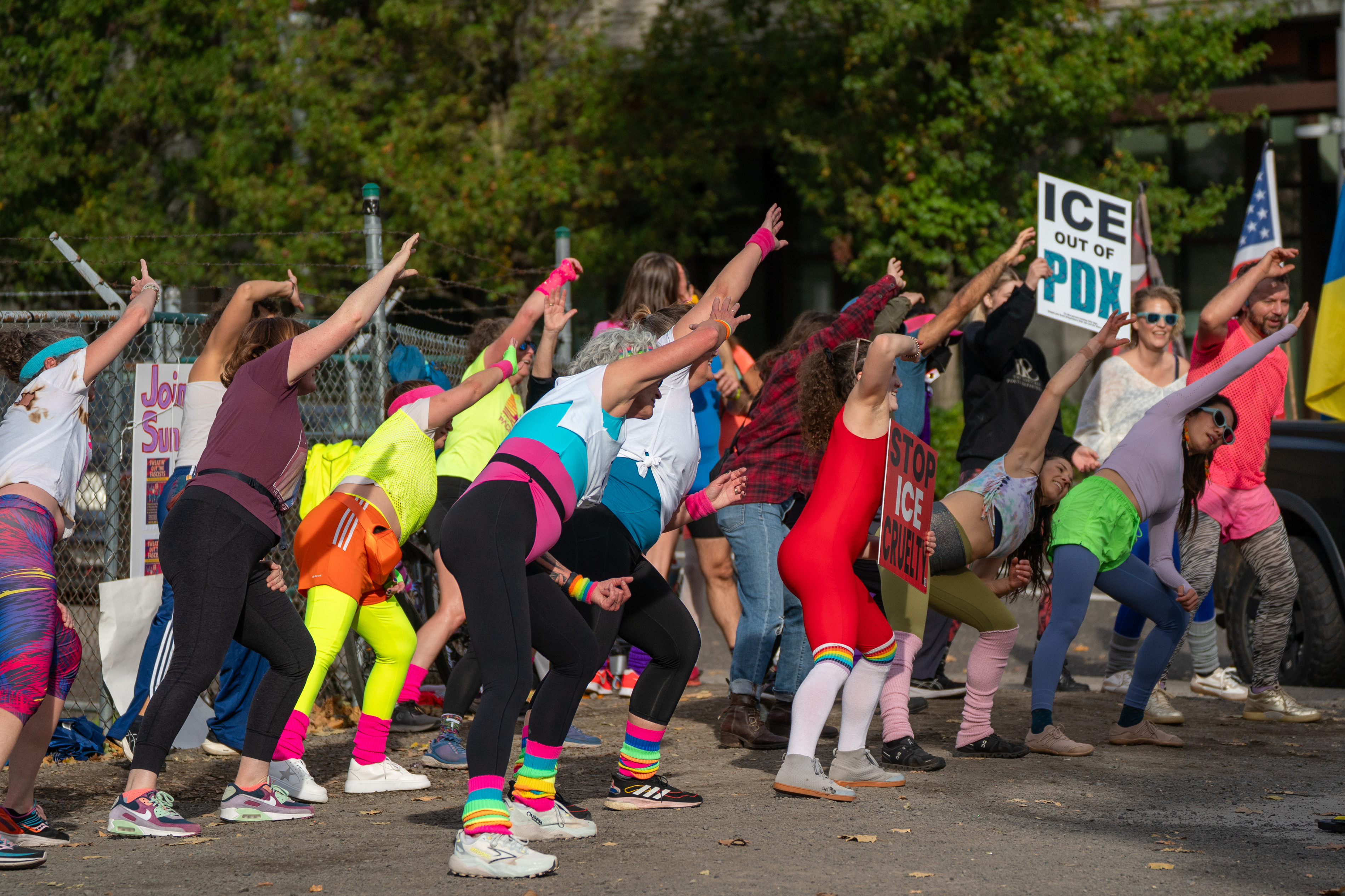 Participants in Fulcrum Fitness’s “Sweatin’ Out the Fascists” held an ’80s-aerobics peaceful protest outside the U.S. Immigration and Customs Enforcement (ICE) facility in South Portland on Sunday, Nov. 9, 2025, collecting donations for the Oregon Food Bank.