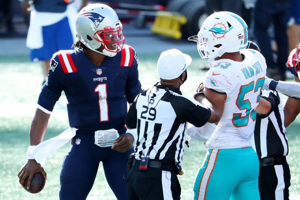 Miami Dolphins hold New England Patriots, Cam Newton in check