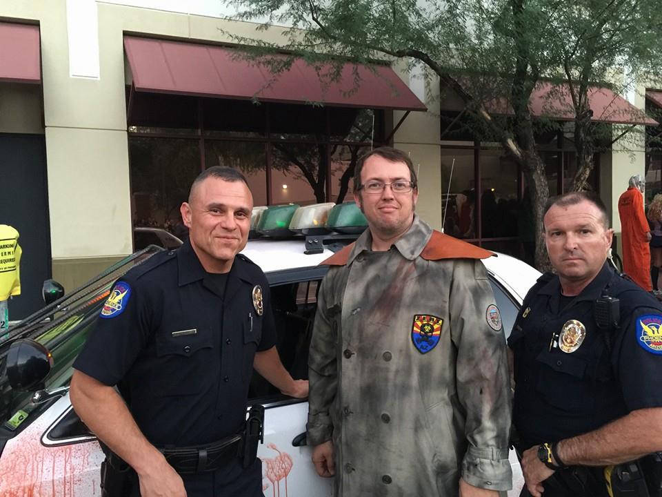 Photo of Bryan Patrick Miller, center, suspect in the 1992 murder of Angela Brosso in Phoenix, Az., from his Facebook account "Arizona Zombie Hunter". The caption reads: Phoenix PD showing their support.