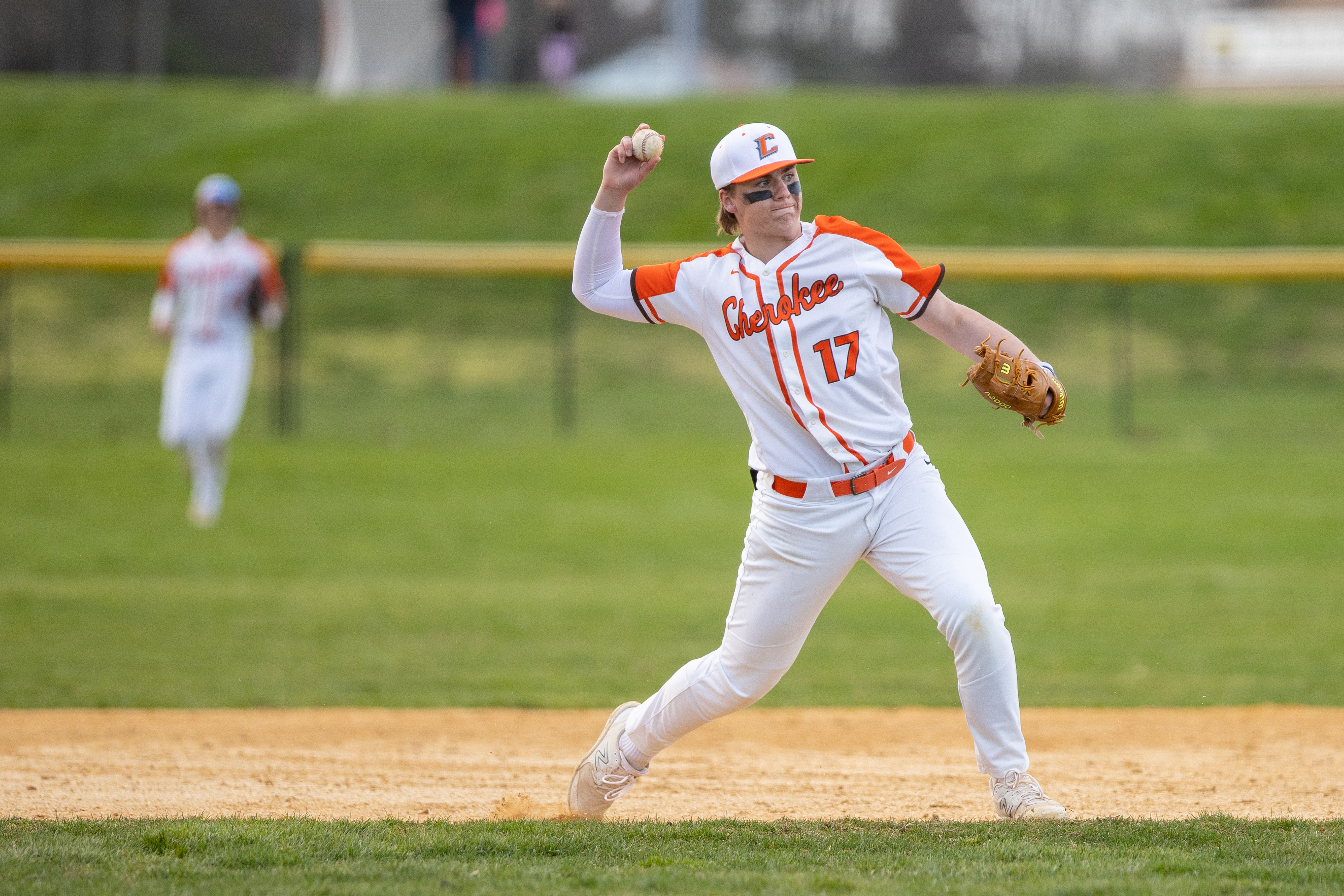 Brett Chiesa (17) of Cherokee, throws to first in Marlton, NJ on Monday, April 3, 2023.