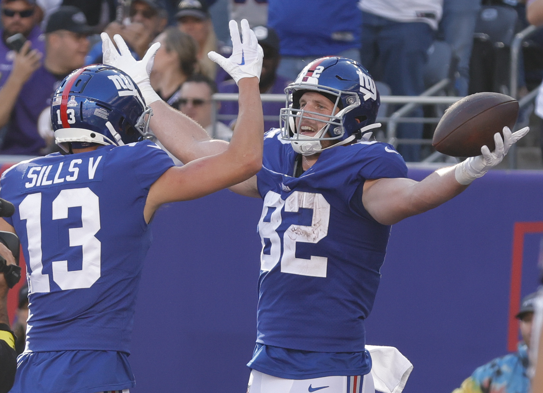 New York Giants safety Dane Belton (24) and linebacker Tomon Fox