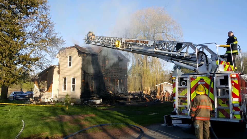 3 escape house fire in Caledonia Township