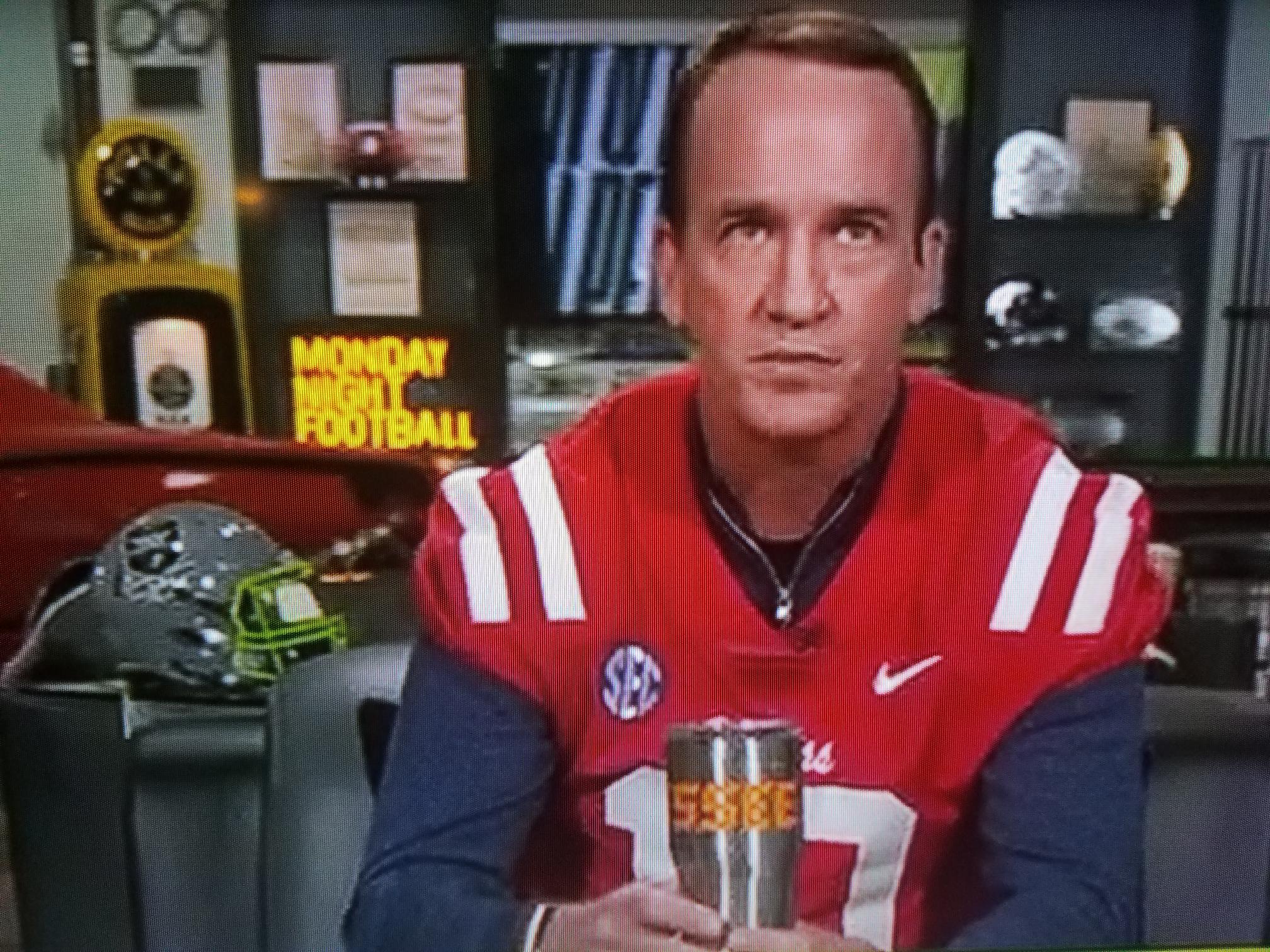 Manning Cast: Peyton wears Eli's Ole Miss jersey after losing bet - Sports  Illustrated