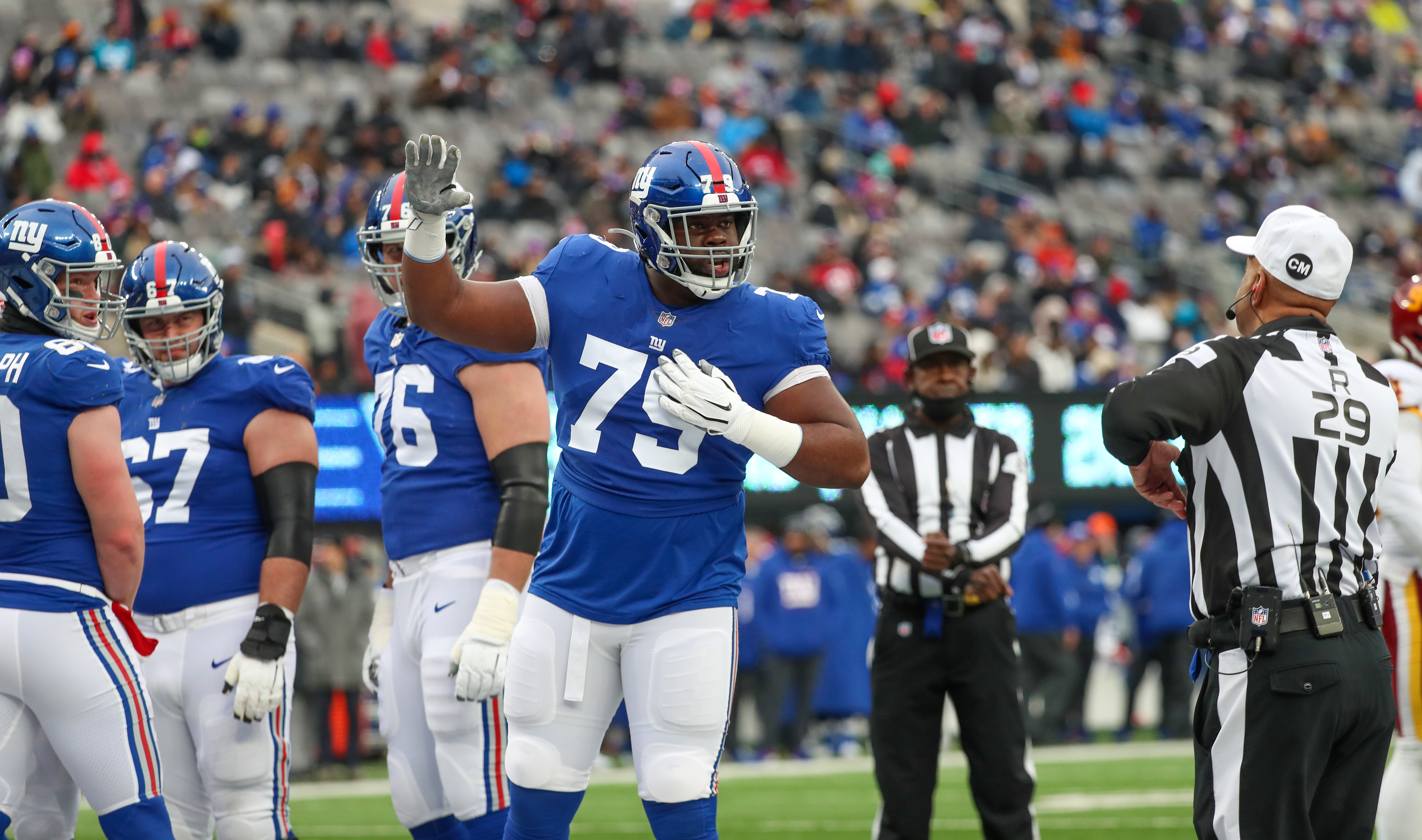 New York Giants offensive tackle Korey Cunningham (79) checks in with the official to be an eligible receiver during the second quarter against the Washington Football Team on Sunday, Jan. 9, 2022 in East Rutherford, N.J. Washington won, 22-7.