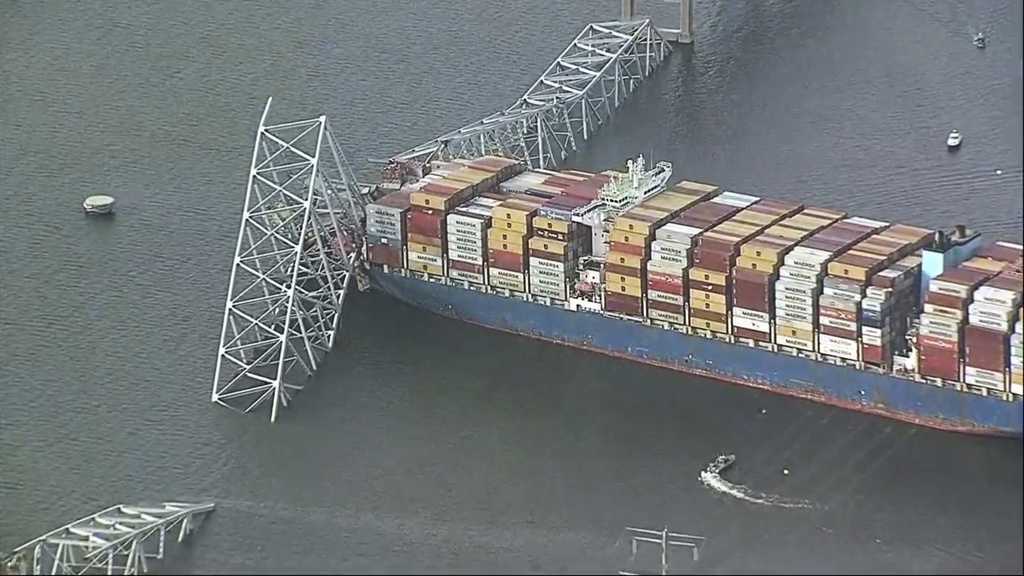 Baltimore bridge collapses after powerless cargo ship rams into support ...