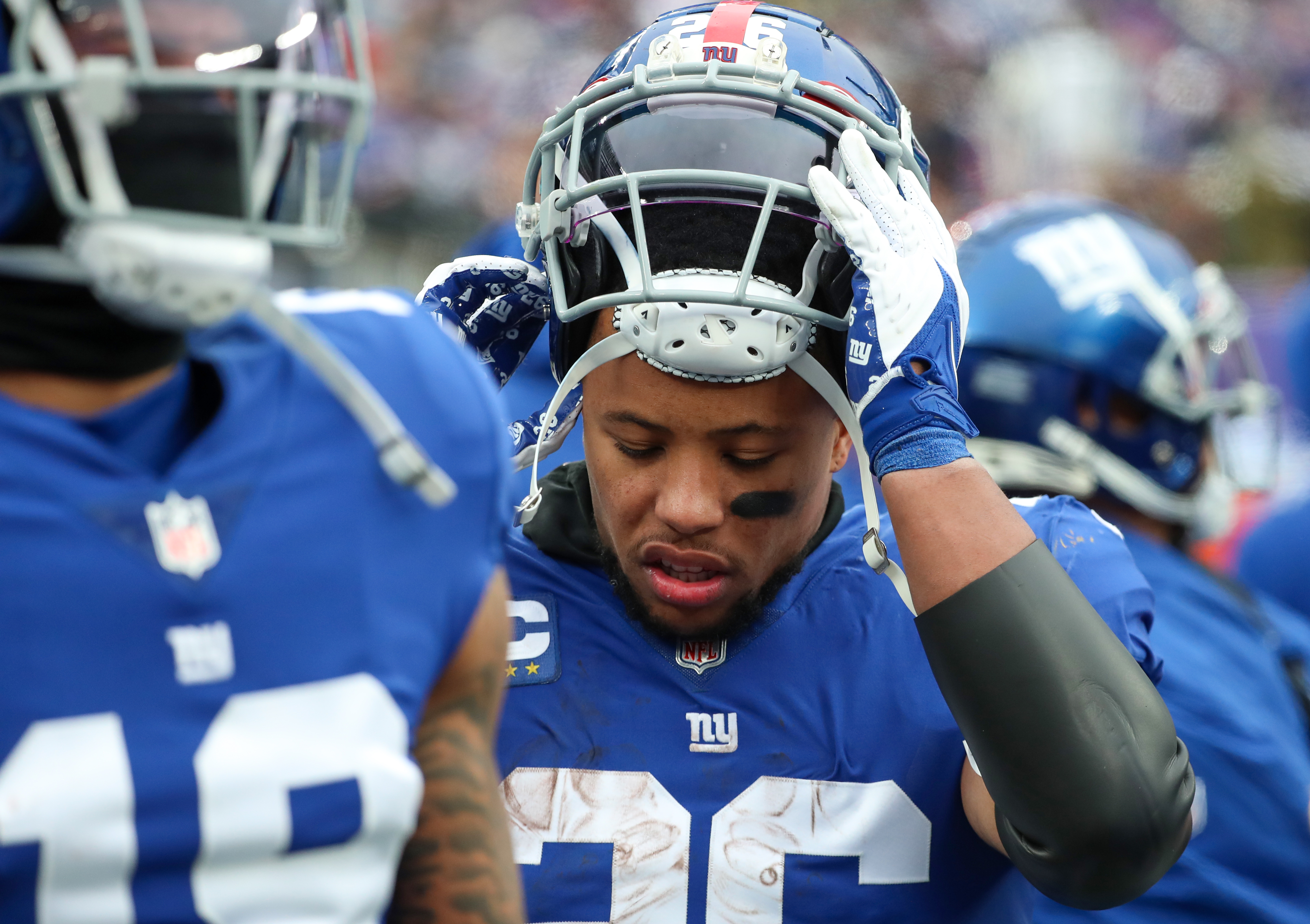 New York Giants running back Saquon Barkley (26) gained 30 yards on 11 carries in a losing effort against the Washington Football Team on Sunday, Jan. 9, 2022 in East Rutherford, N.J. Washington won, 22-7.