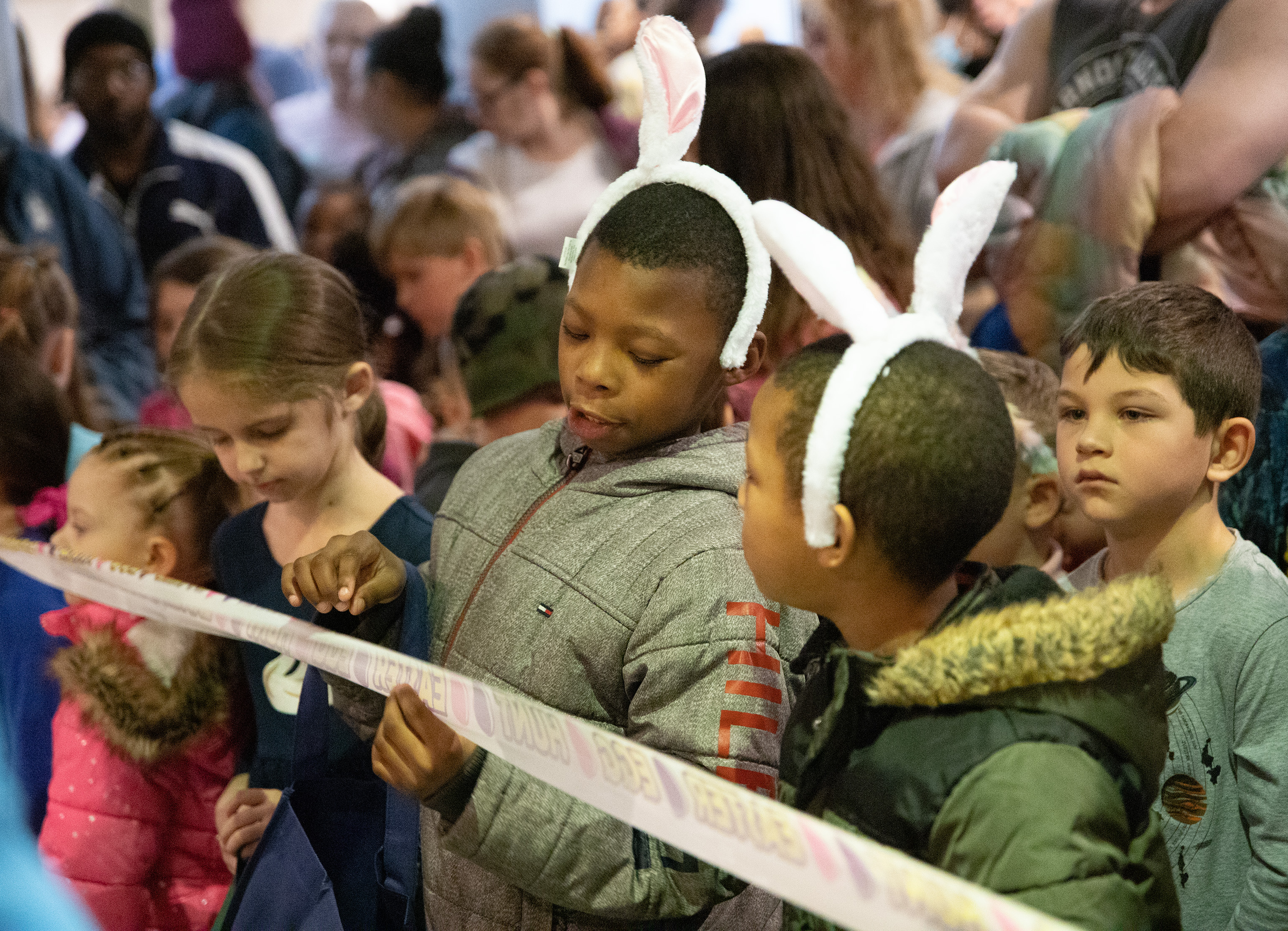 Kids stuff pockets with candy at Egg Hunt Eggstravaganza, News