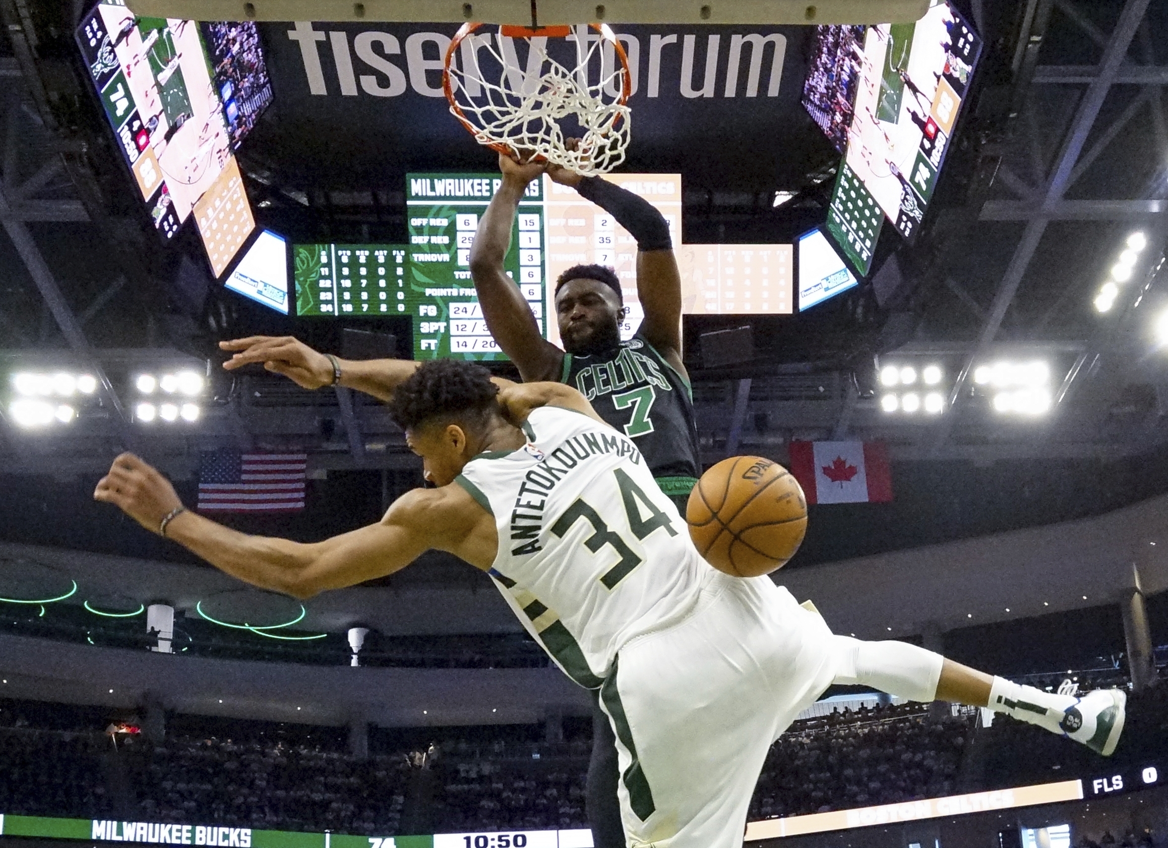 Photographer who captured Jaylen Brown s dunk on Giannis Antetokounmpo also took iconic photo of LeBron James Dwyane Wade masslive