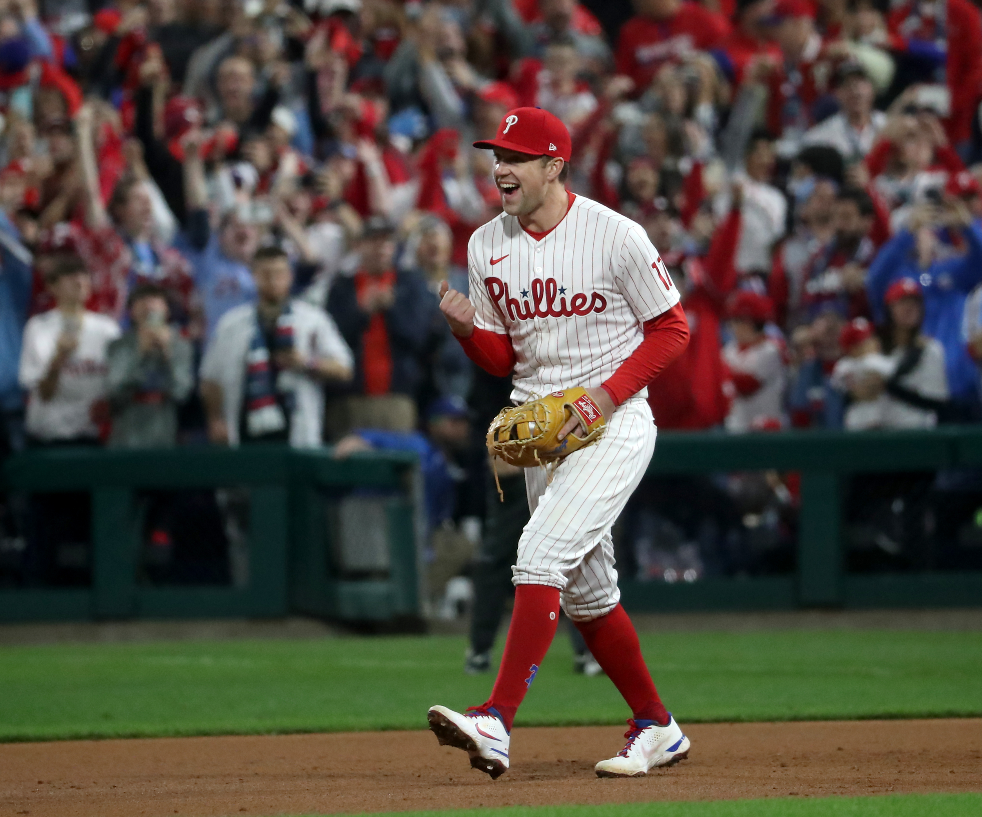 Rhys Hoskins (17) of the Philadelphia Phillies celebrates a 7-0 win during World Series Game 3 against the Houston Astros at Citizens Bank Park, Tuesday, Nov. 1, 2022.