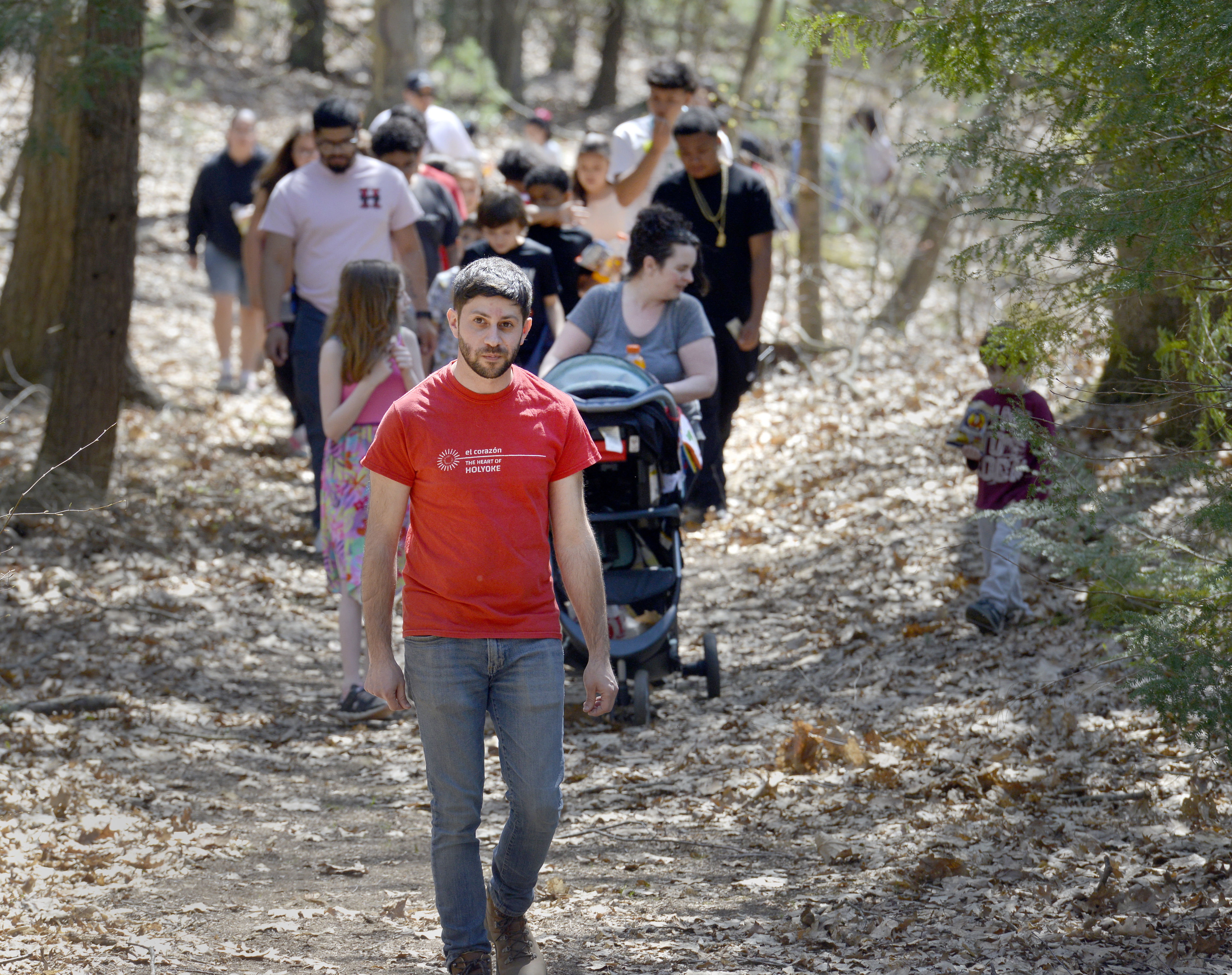 Yoni Glogower, Holyoke's Director of Conservation and Sustainability, leads a hike along the recently renovated Gloutak Woods Trail.  (Don Treeger / The Republican)  4/21/2023