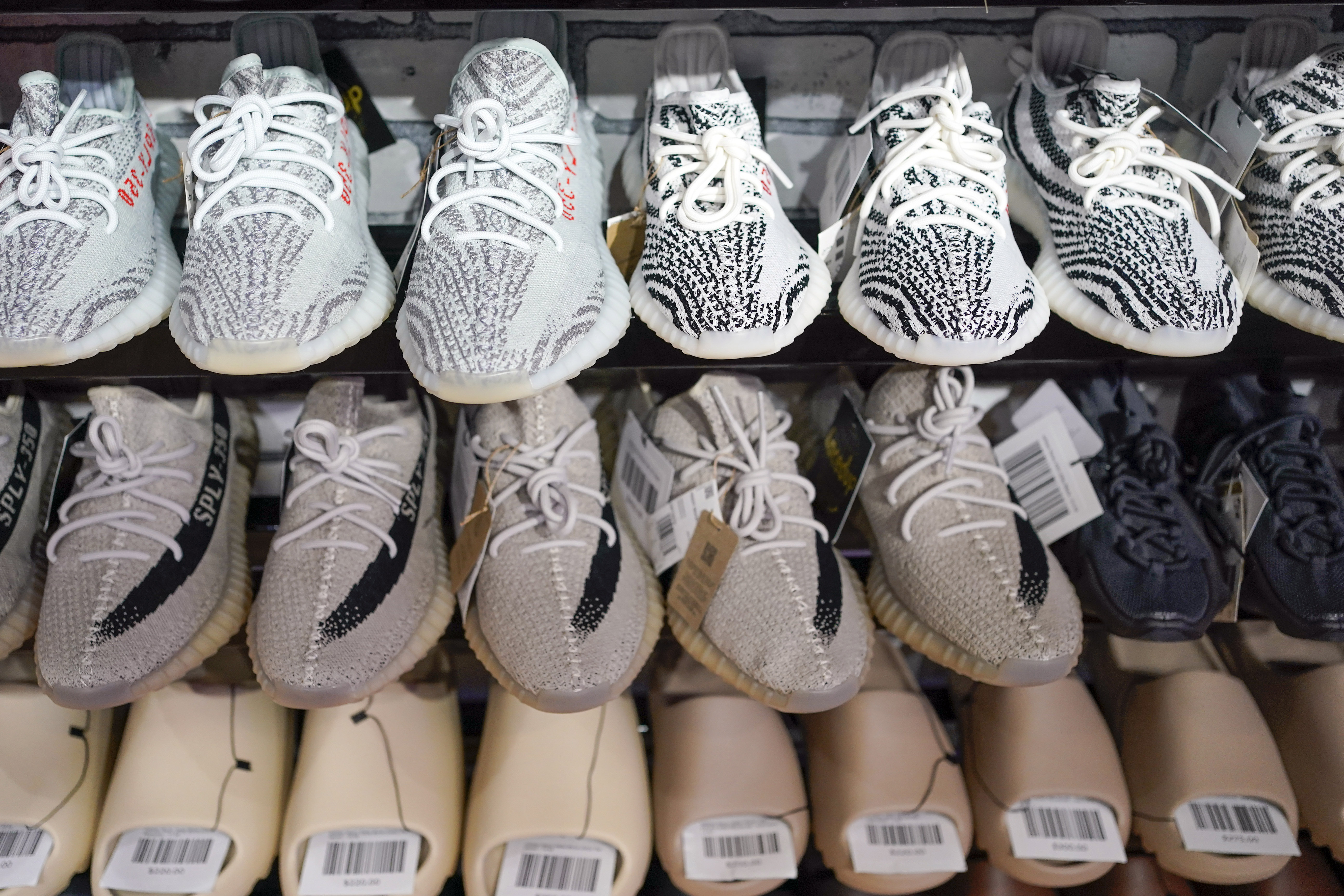 Adidas to sell more surplus Yeezy sneakers, clearing stock from scuttled -