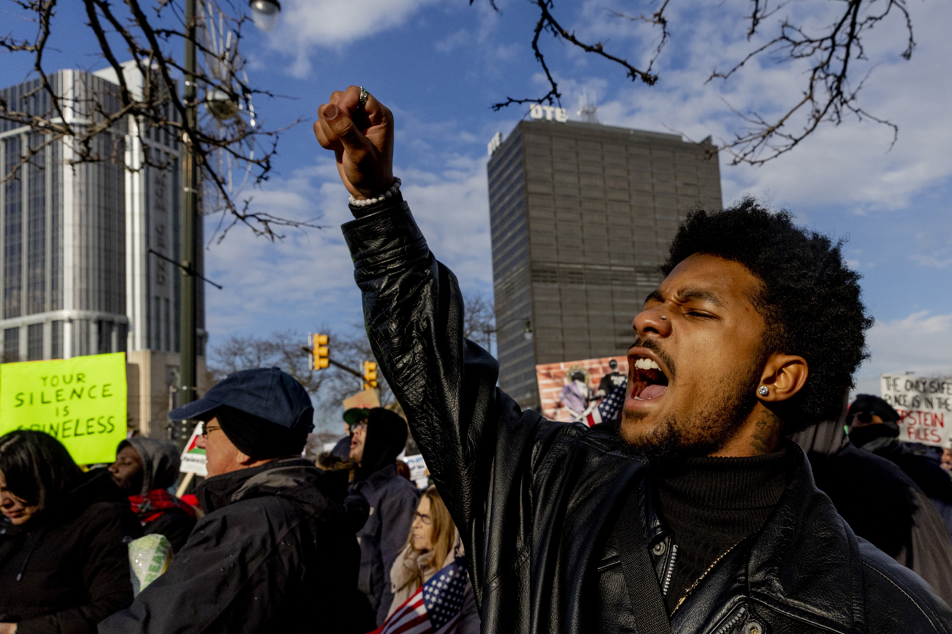 Hundreds protest President Donald Trump through streets of Detroit ...
