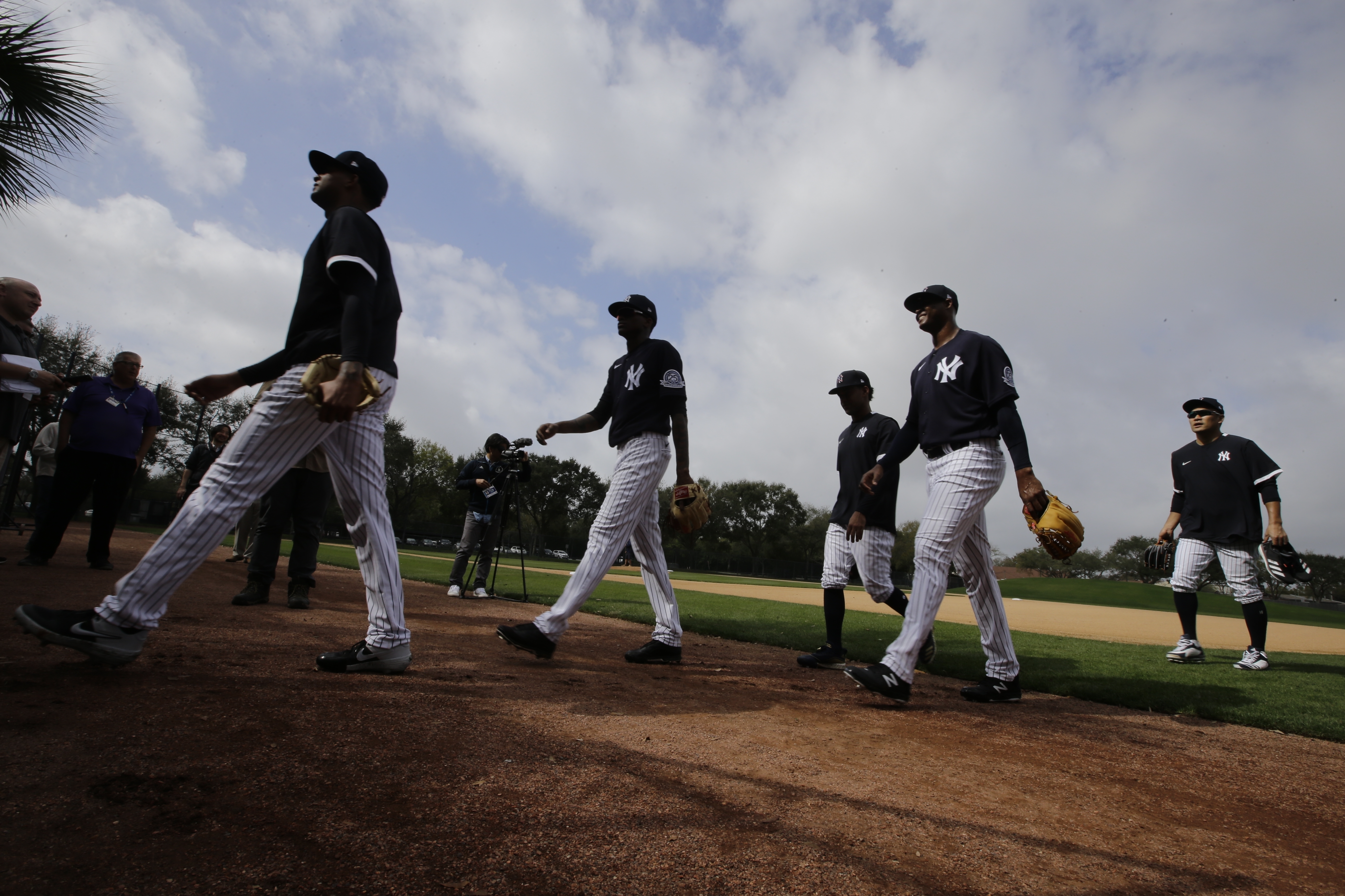 When do pitchers and catchers report? - Baseball Stadium