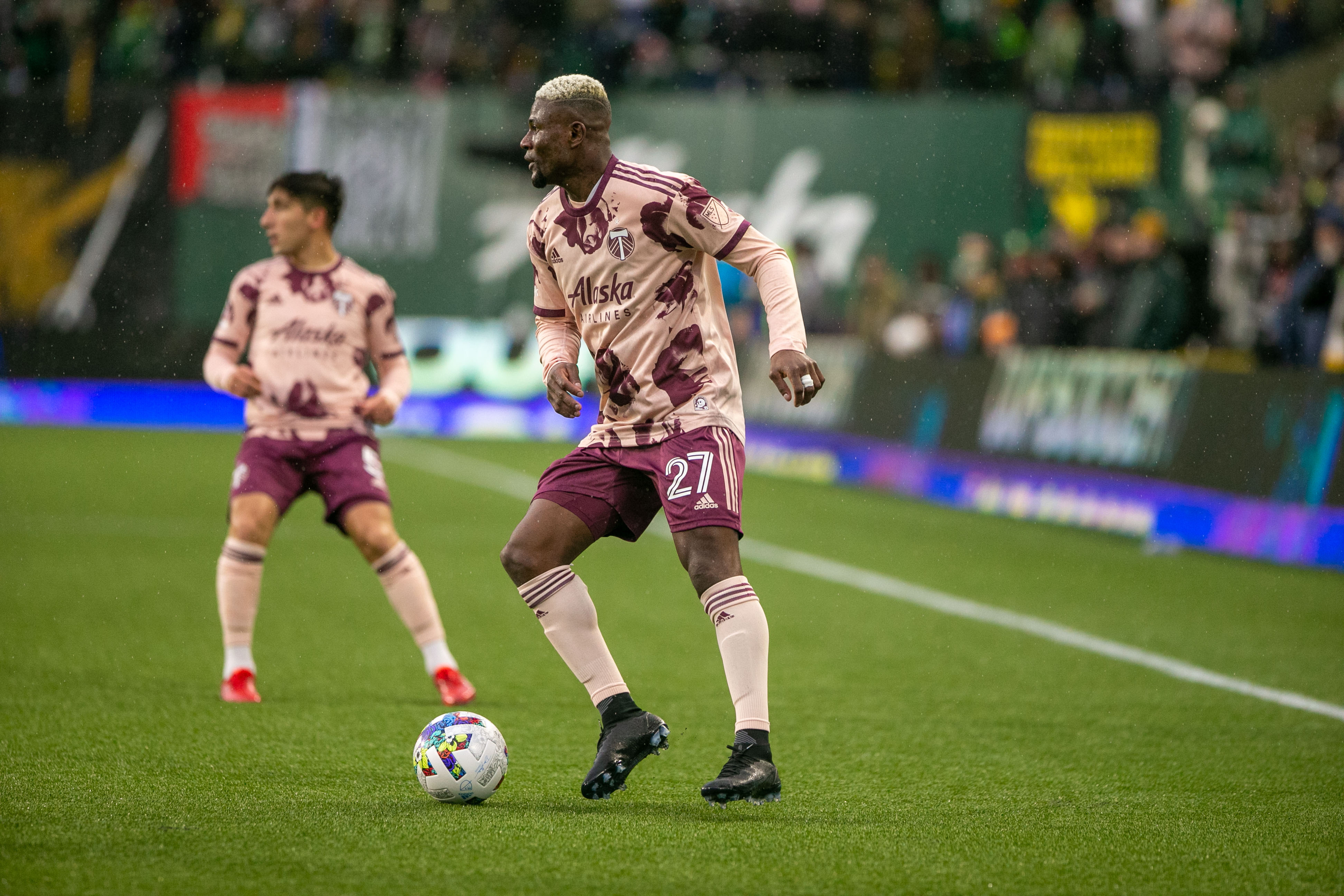 Chara scores on bicycle kick, Timbers tie Revs 2-2 in opener - The