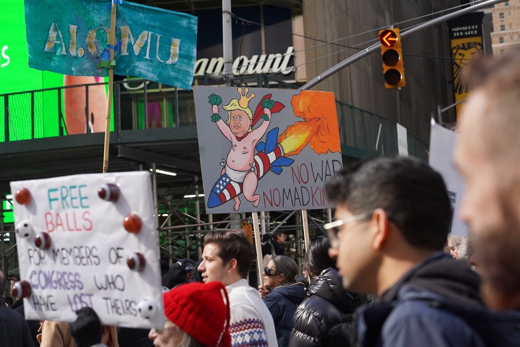 Photos: Tens of thousands march through Times Square in ‘No Kings ...