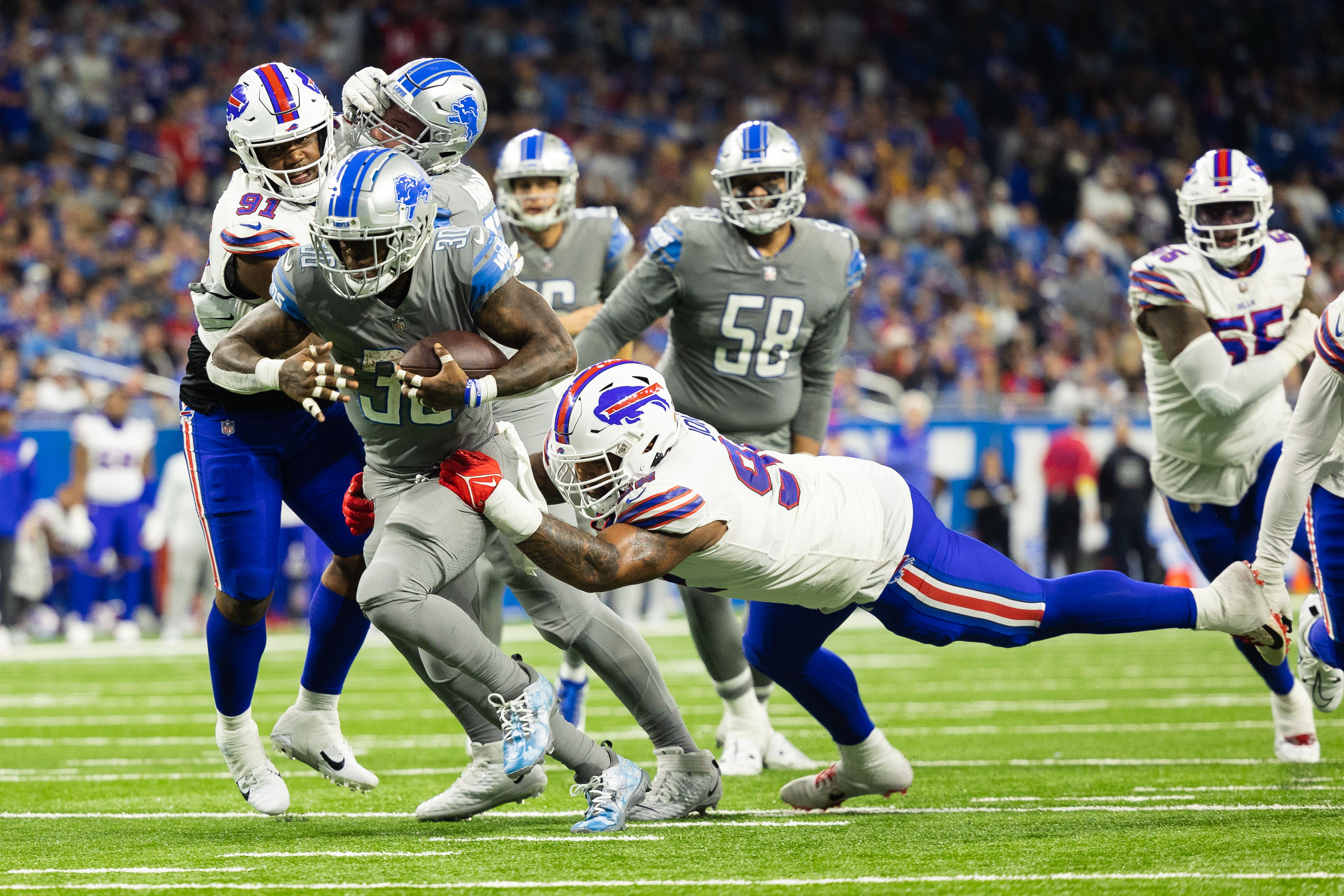 Detroit Lions' Jerry Jacobs breaks up a pass intended for