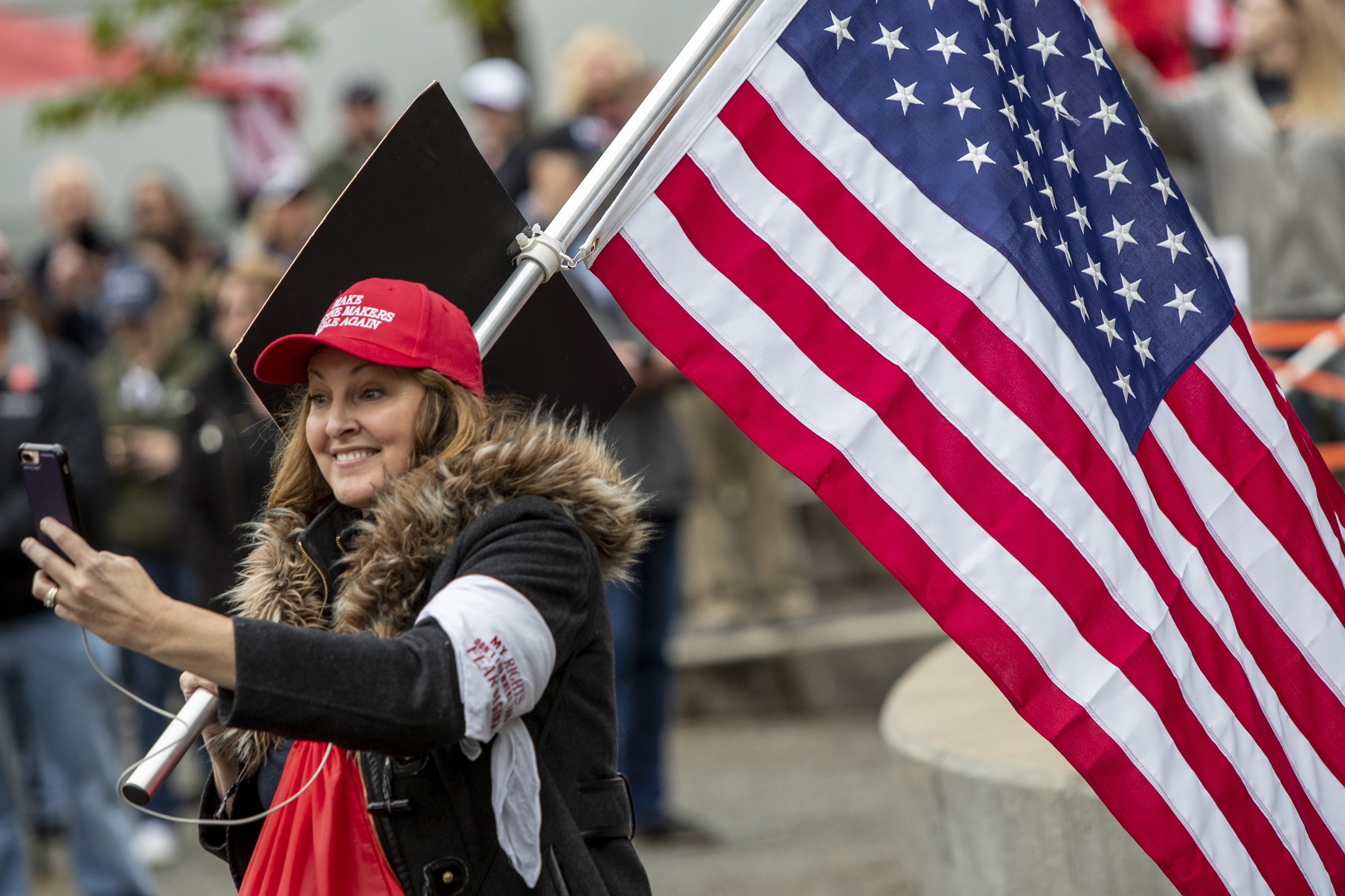 A crowd gathers for the "American Patriot Rally-Sheriffs speak out" event at Rosa Parks Circle in downtown Grand Rapids on Monday, May 18, 2020. The crowd is protesting against Gov. Gretchen Whitmer's stay-at-home order. (Cory Morse | MLive.com)