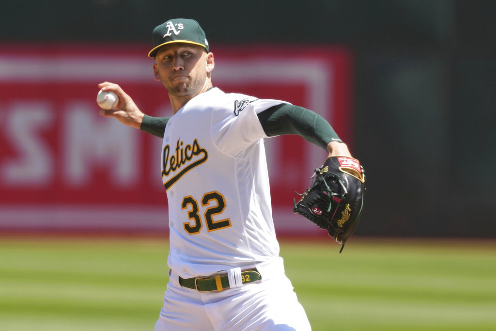 James Kaprielian of the Oakland Athletics pitches during the first