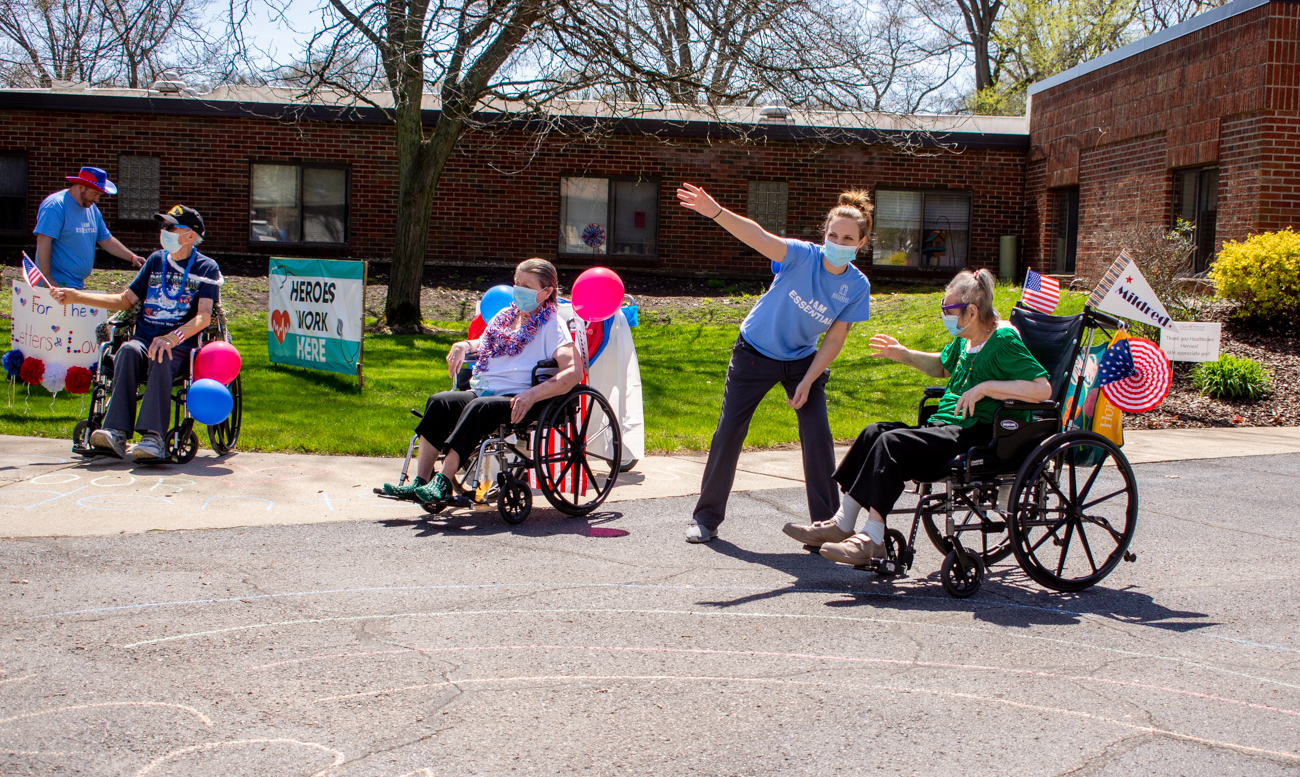 Honk and wave parade for residents and staff of North Muskegon nursing ...