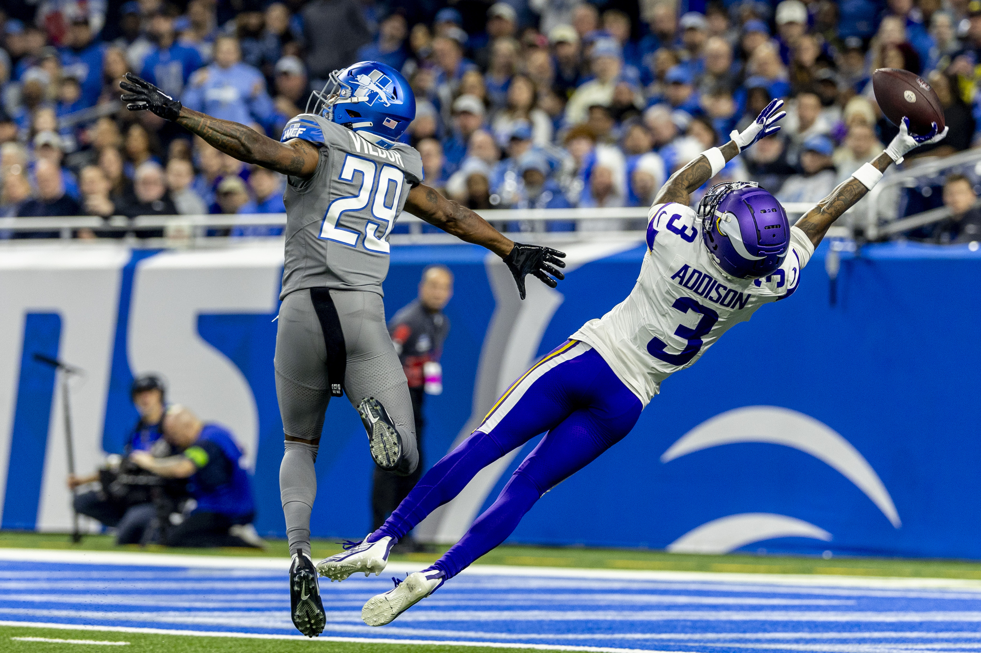 Minnesota Vikings rookie wide receiver Jordan Addison reaches for a near one-handed grab, but bobbles and drops the pass in the end zone in the last regular season game against the Minnesota Vikings on Sunday, Jan. 7, 2024 at Ford Field in Detroit.