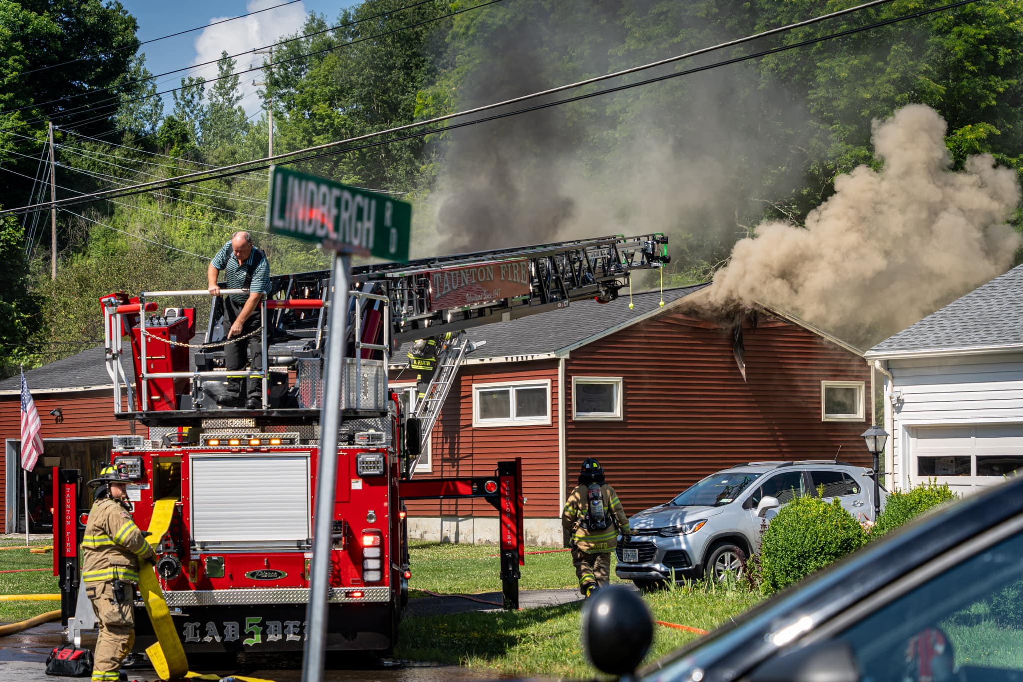 Multiple fire departments respond to a deck fire that spread through a ...