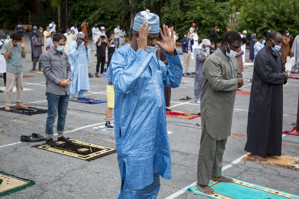 Adam Habl, of Harrisburg, prays during celebration for the muslim holiday Eid Al-Adha in the parking lot of the Islamic Center Masjid Al-Sabereen in Harrisburg, Pa., July 31, 2020.
Mark Pynes | mpynes@pennlive.com
