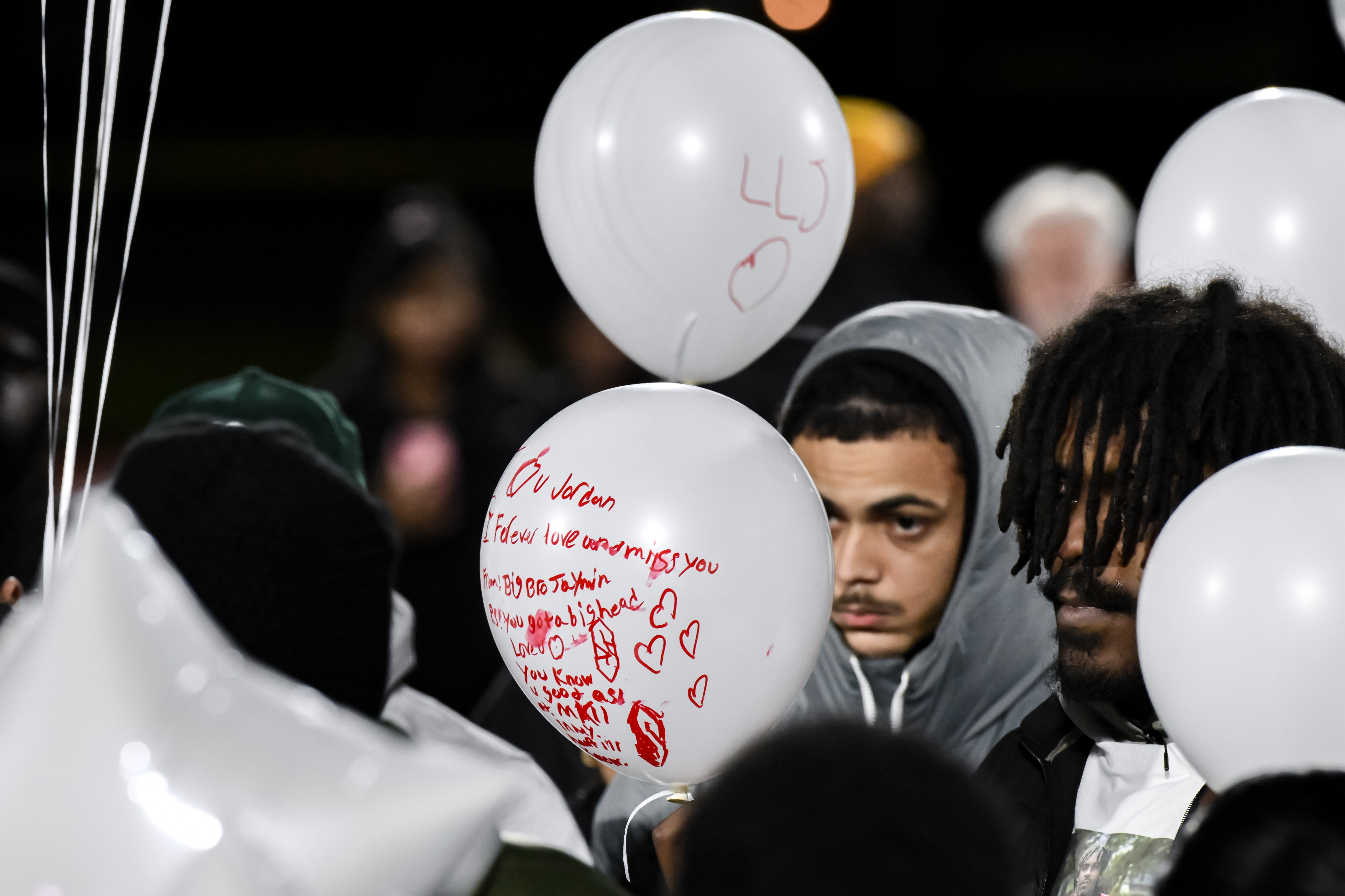 Community honors Newark shooting victims with a balloon release ...