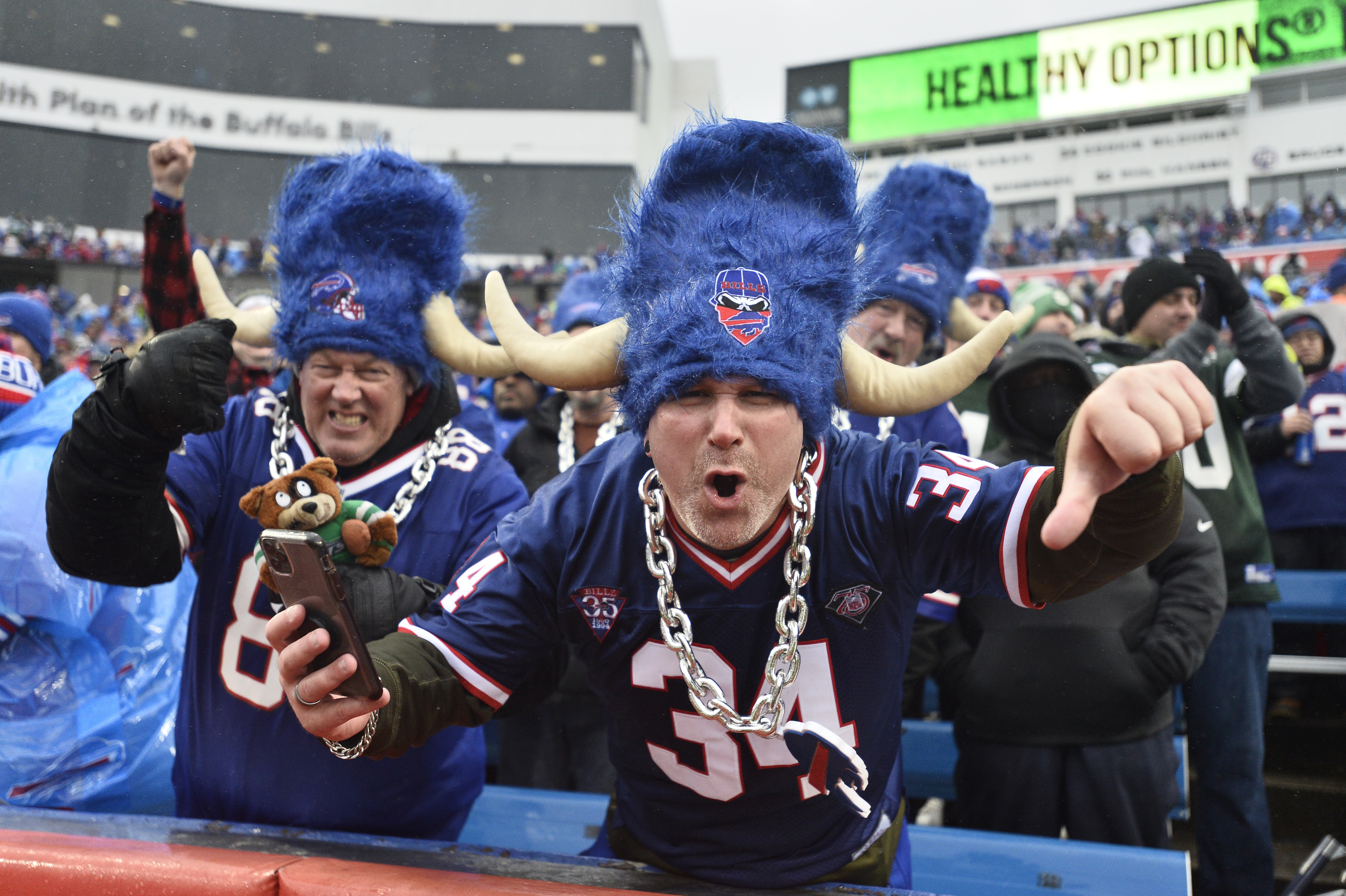 Buffalo Bills tackle Dion Dawkins (73) runs on the field during the second  half of an NFL football game against the New York Jets in Orchard Park,  N.Y., Sunday, Dec. 11, 2022. (