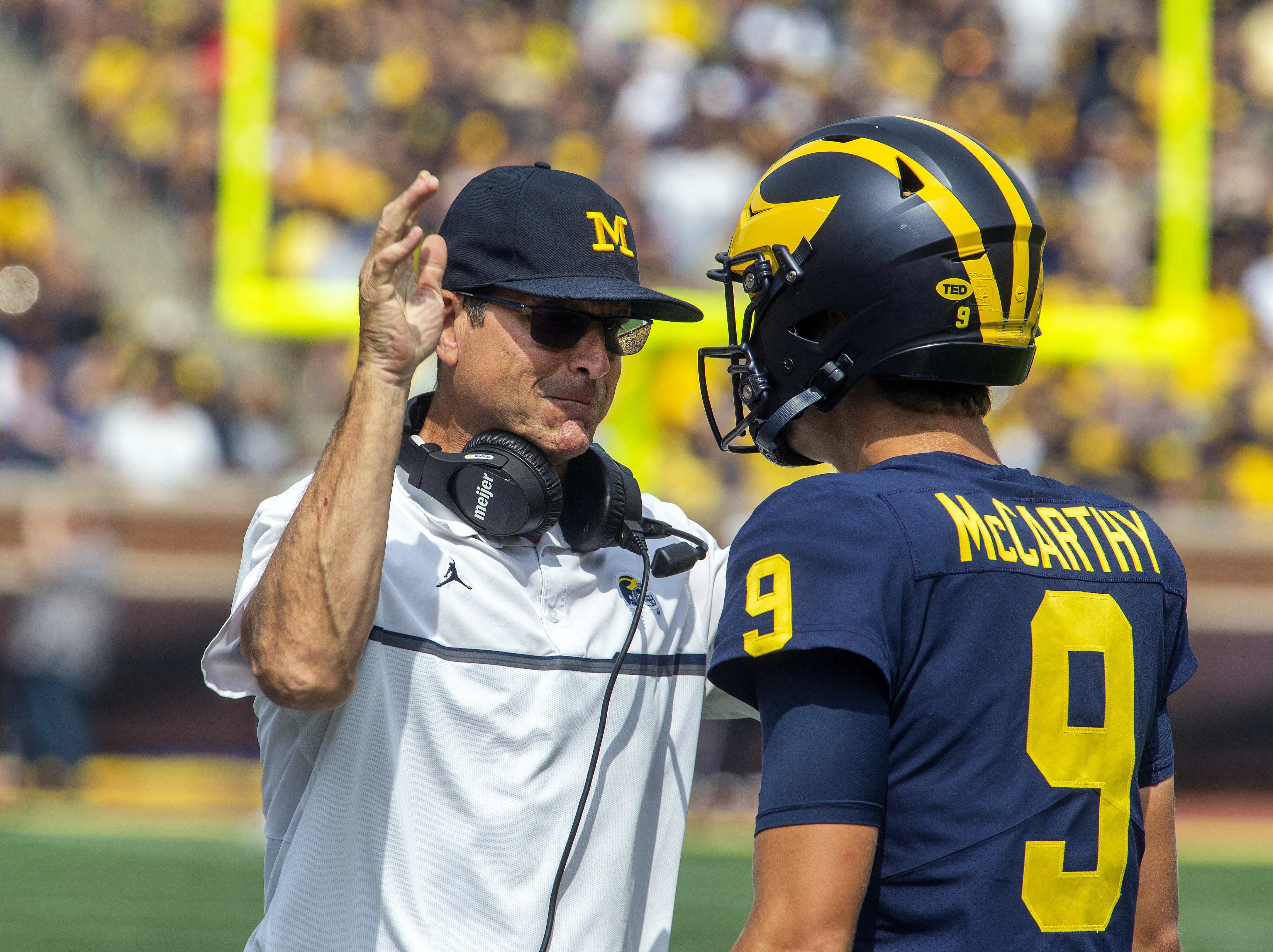 Jim Harbaugh claims 'support' for Michigan players who raised fists