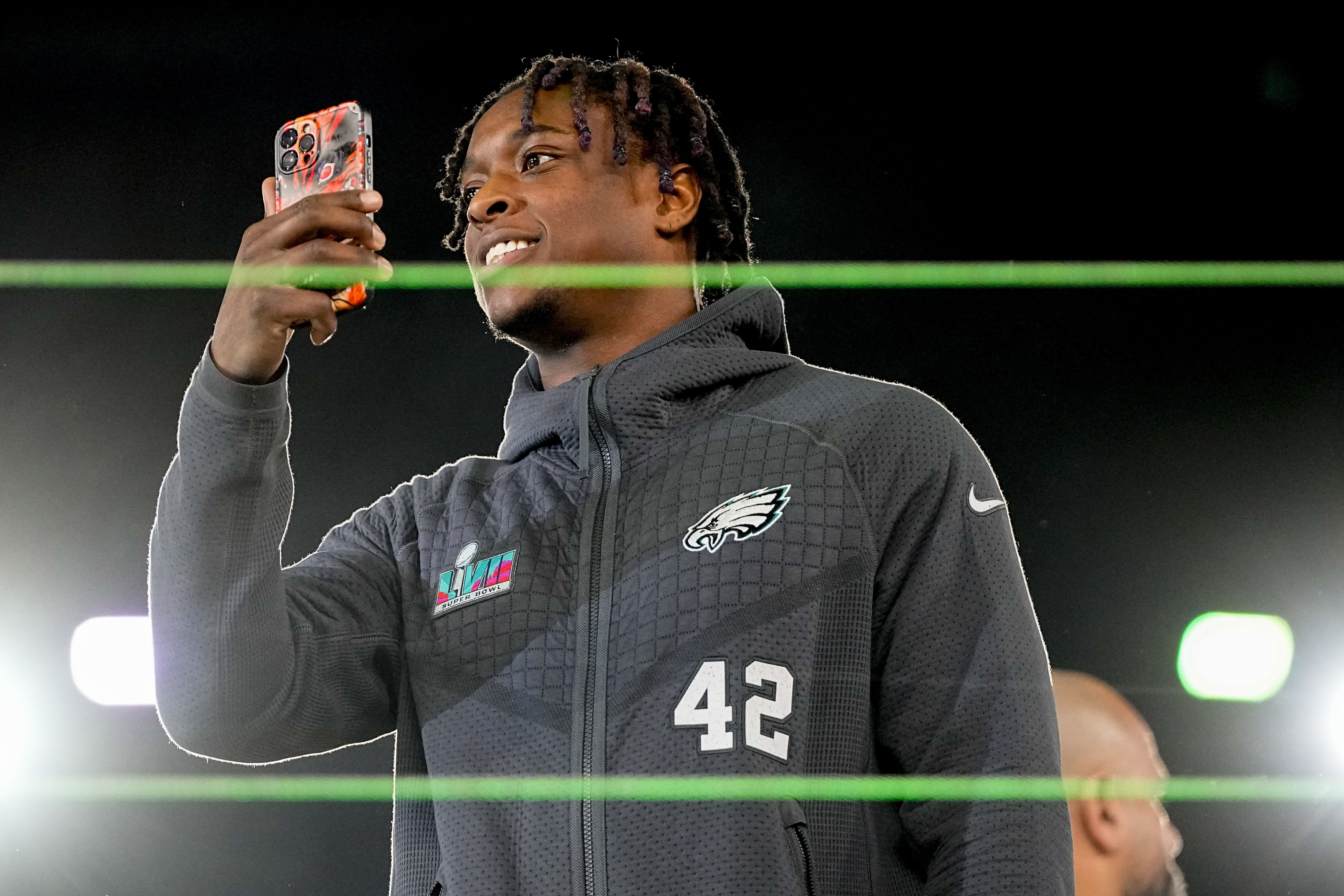 Philadelphia Eagles linebacker Nakobe Dean (17) and defensive tackle Jordan  Davis (90) head off the field following the NFL football game against the  New York Giants, Sunday, Jan. 8, 2023, in Philadelphia. (