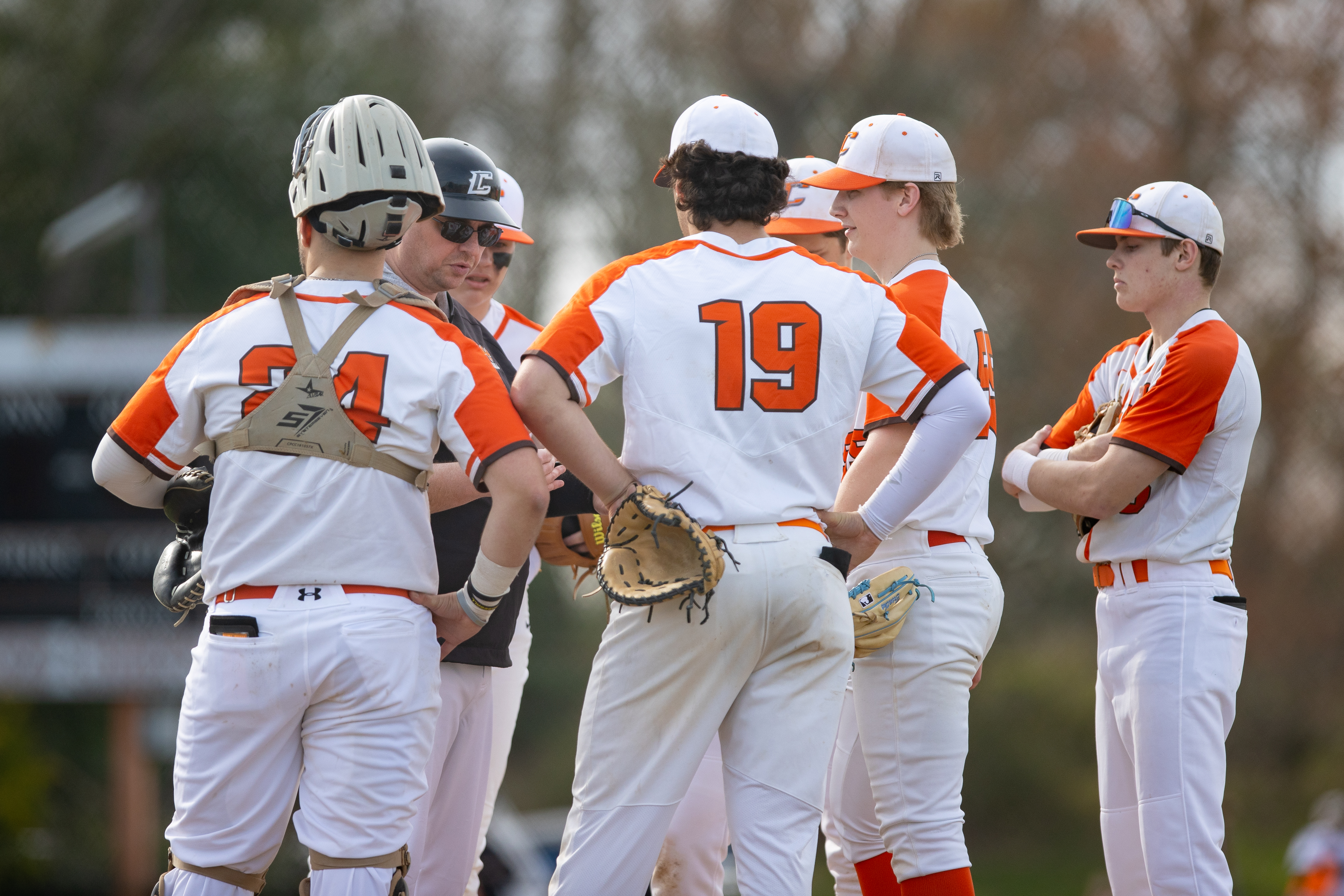 Head Coach Marc Petragnani, of Cherokee, speaks with his pitcher in Marlton, NJ on Monday, April 3, 2023.