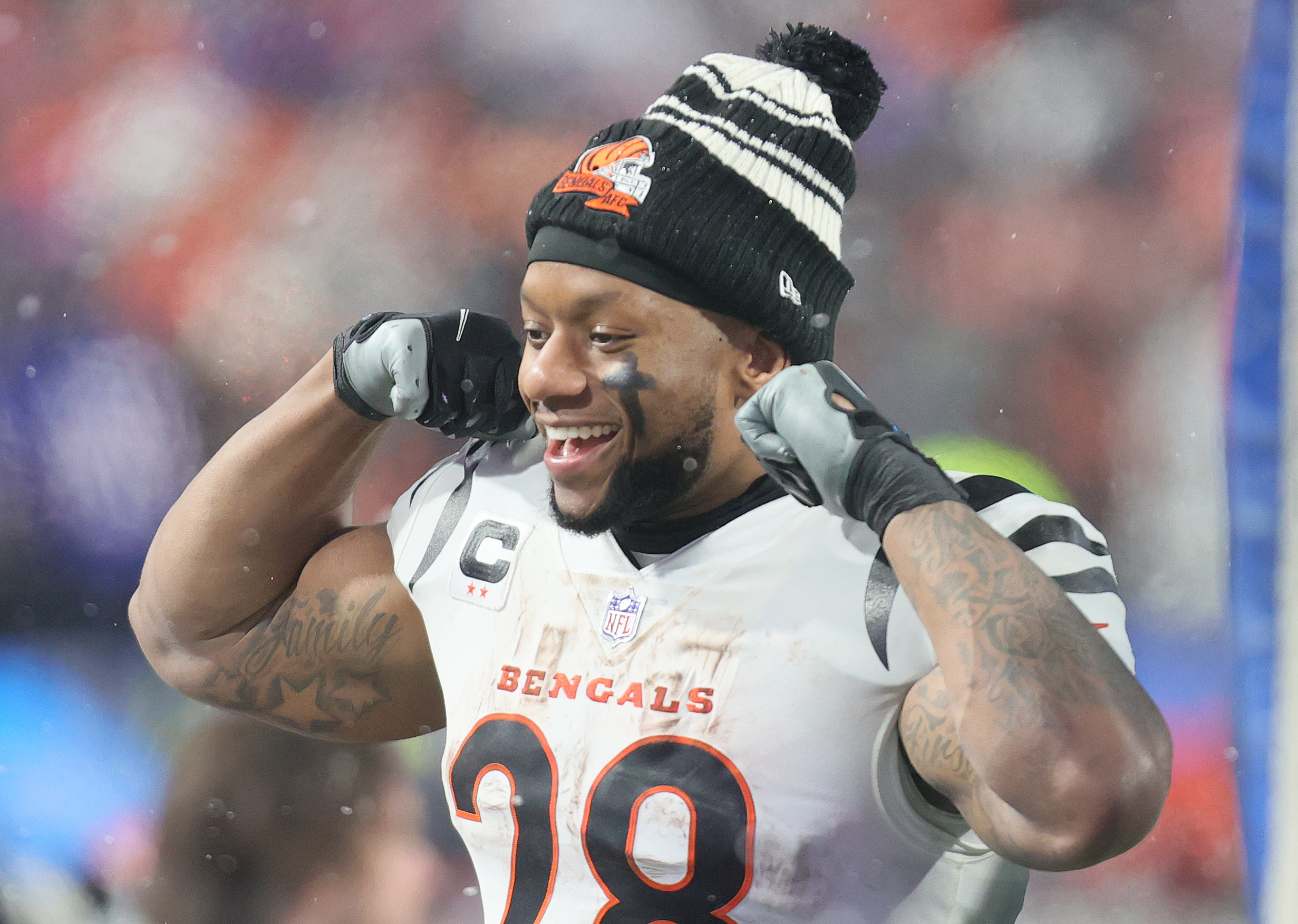 Cincinnati Bengals running back Joe Mixon (28) is tackled by the Buffalo  Bills during the first quarter of an NFL division round football game,  Sunday, Jan. 22, 2023, in Orchard Park, N.Y. (