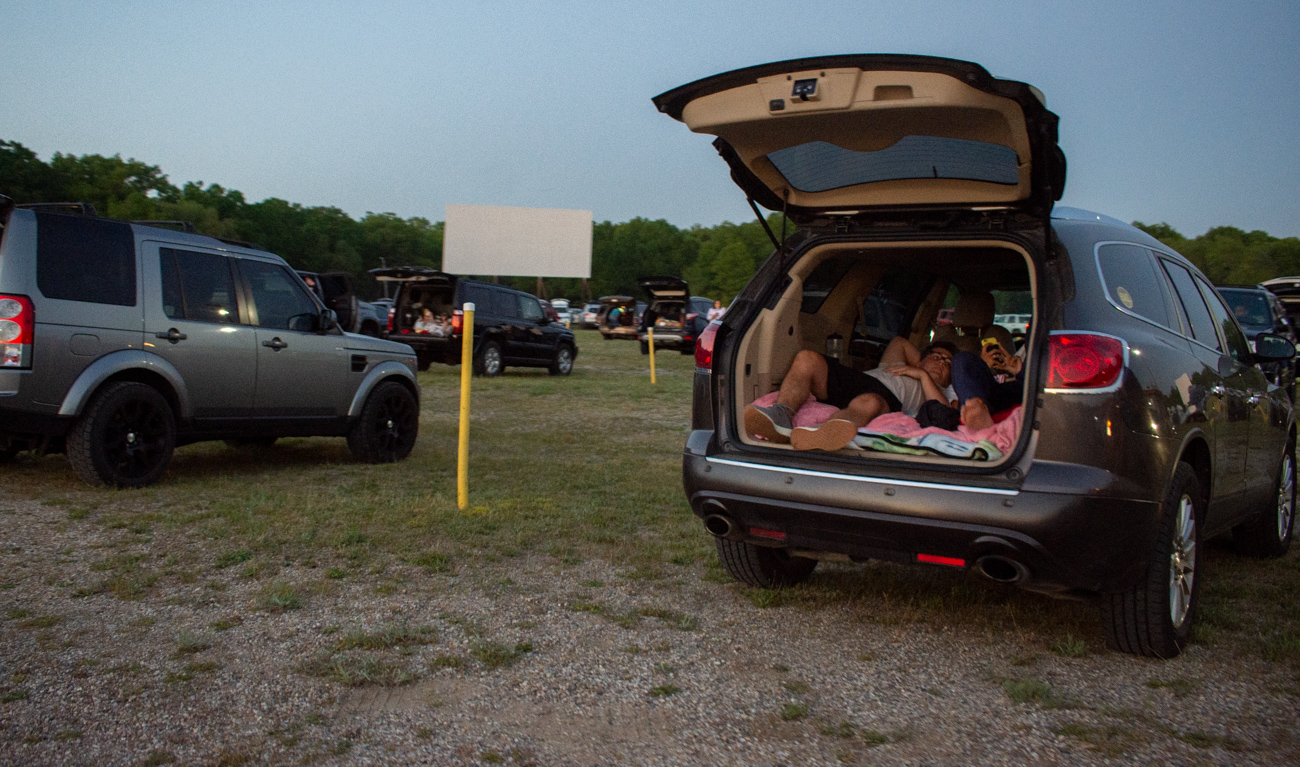 Hundreds of cars fill Getty Drive-In during a sold out opening night ...
