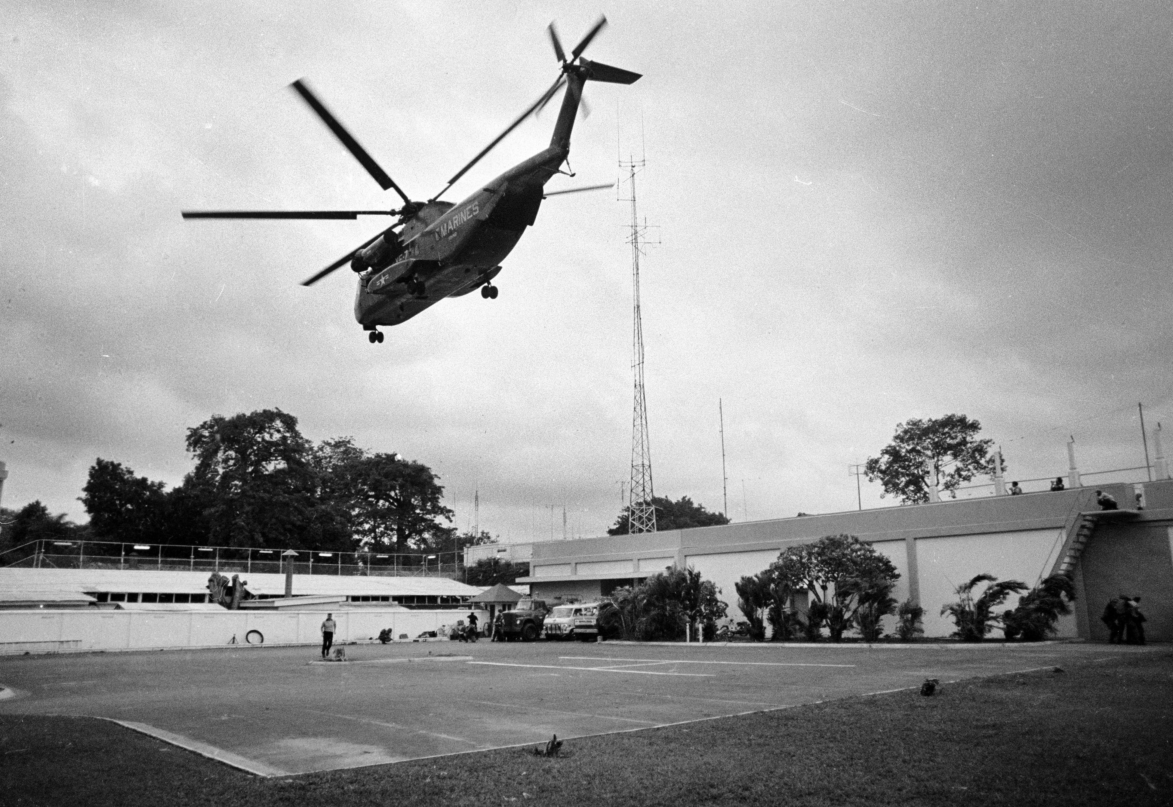 In this April 29, 1975, file photo, a helicopter lifts off from the U.S. embassy in Saigon, Vietnam during last minute evacuation of authorized personnel and civilians. (AP Photo/File)