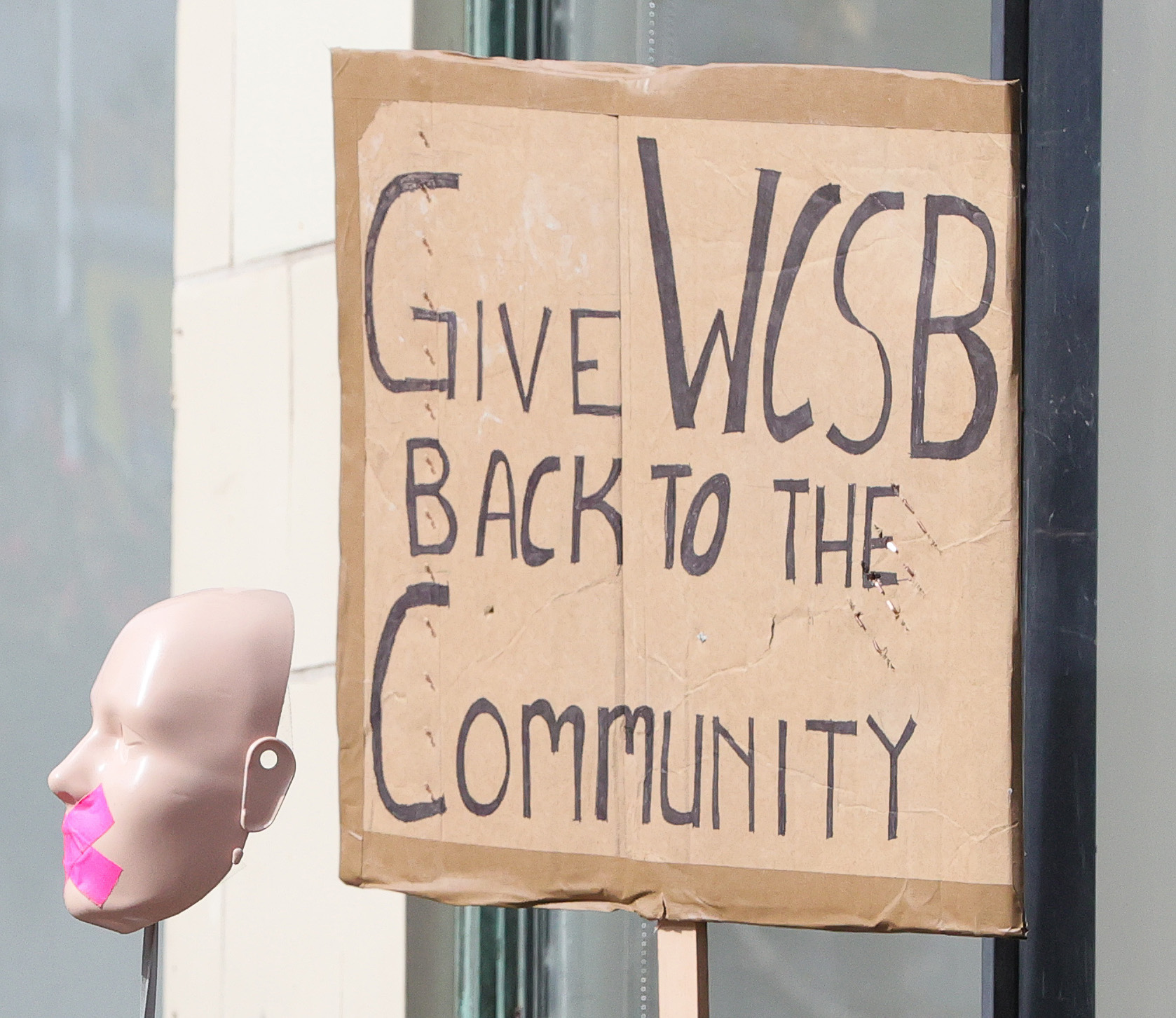 Protestors rally outside Cleveland’s City Club during lunch forum with ...