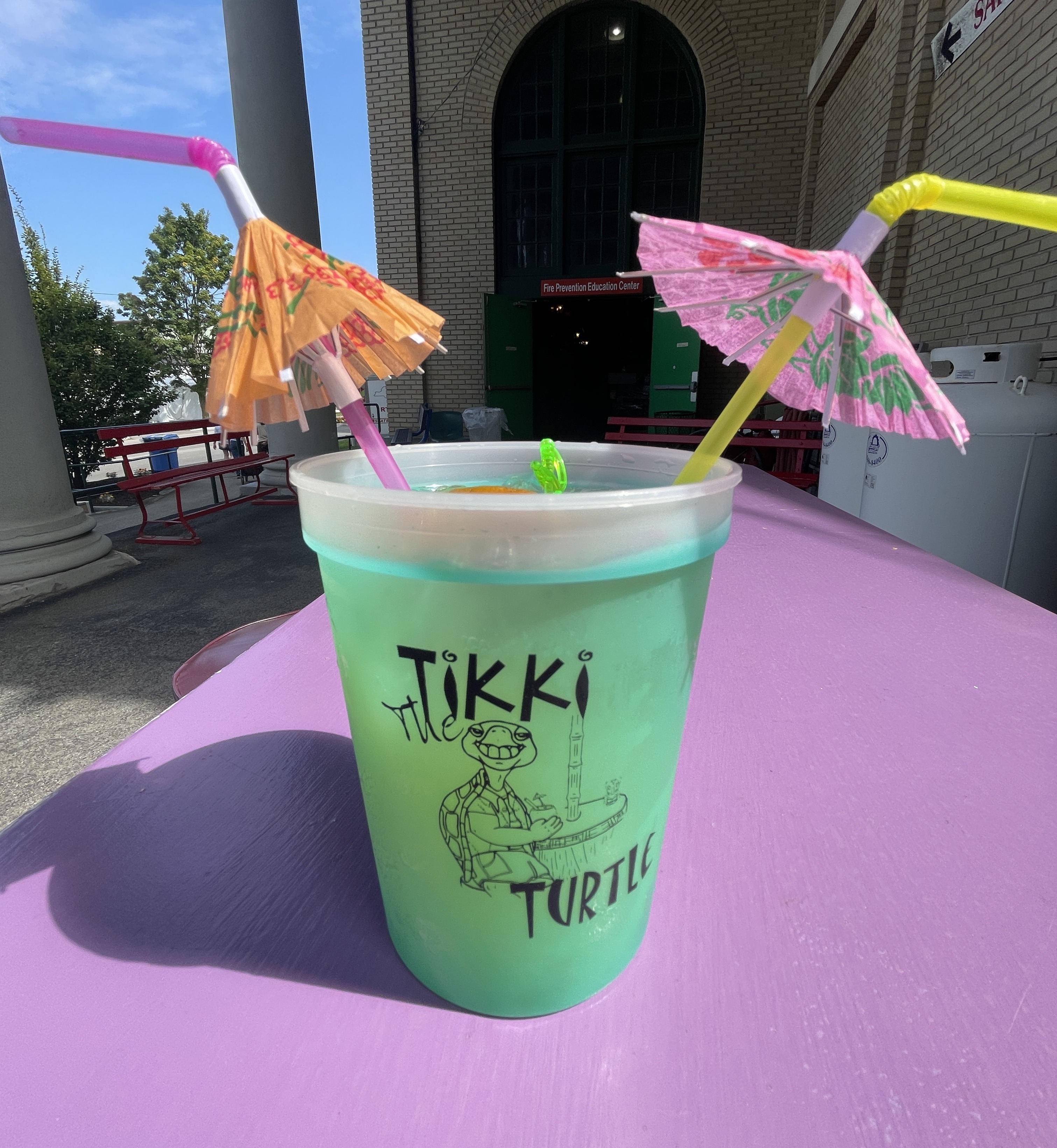 The Tikki Torture is a delicious mixed cocktail at The New York State Fair's Tikki Turtle stand. It features vodka, coconut rum , peach schnapps, orange juice, sweet & sours mix and grenadine. It was served with lime, maraschino cherries and umbrella straws in a color-changing cup. (Katrina Tulloch)
