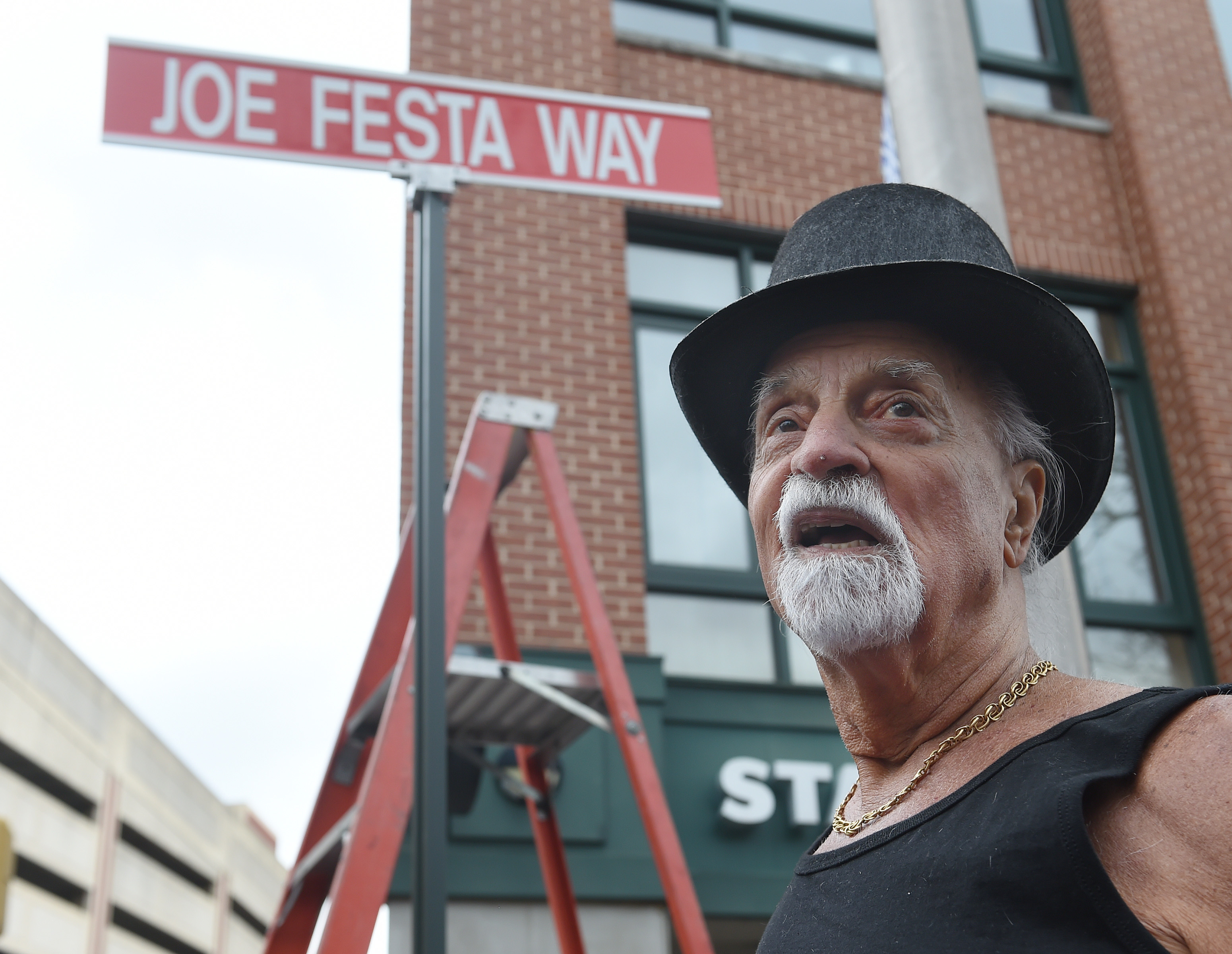 Trenton barber shop owner for 60 years gets street named in his honor