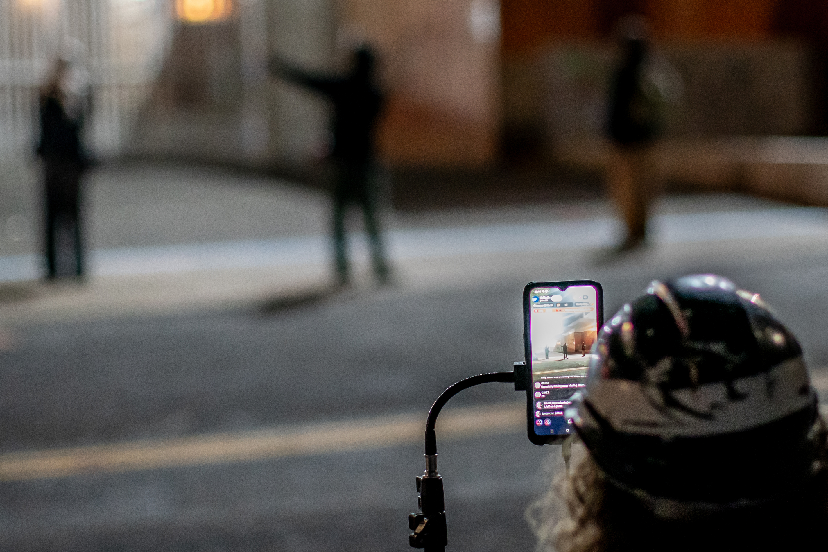 Protesters gather outside the boarded-up U.S. Immigration and Customs Enforcement building in South Portland on Monday, Sept. 8, 2025, days after President Donald Trump suggested federal intervention.